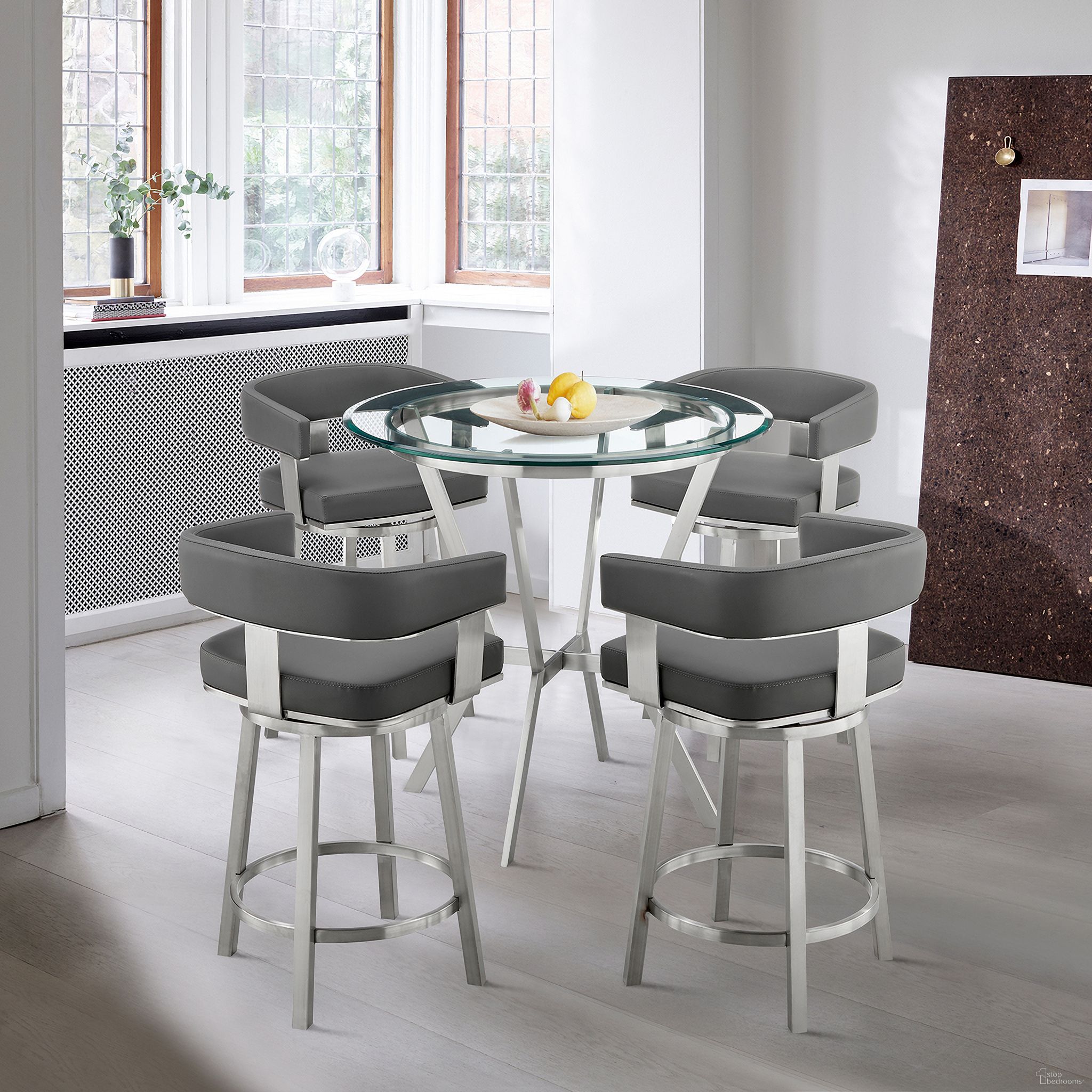 The appearance of Naomi and Lorin 5-Piece Counter Height Dining Set In Brushed Stainless Steel and Gray Faux Leather designed by Armen Living in the modern / contemporary interior design. This stainless steel piece of furniture was selected by 1StopBedrooms from Naomi and Lorin Collection to add a touch of cosiness and style into your home. Sku: LCLRBABSGR26;LCLRBABSGR26;LCLRBABSGR26;LCLRBABSGR26;LCNMDIBSBASE;LCNMDIGLTOP. Material: Stainless Steel.