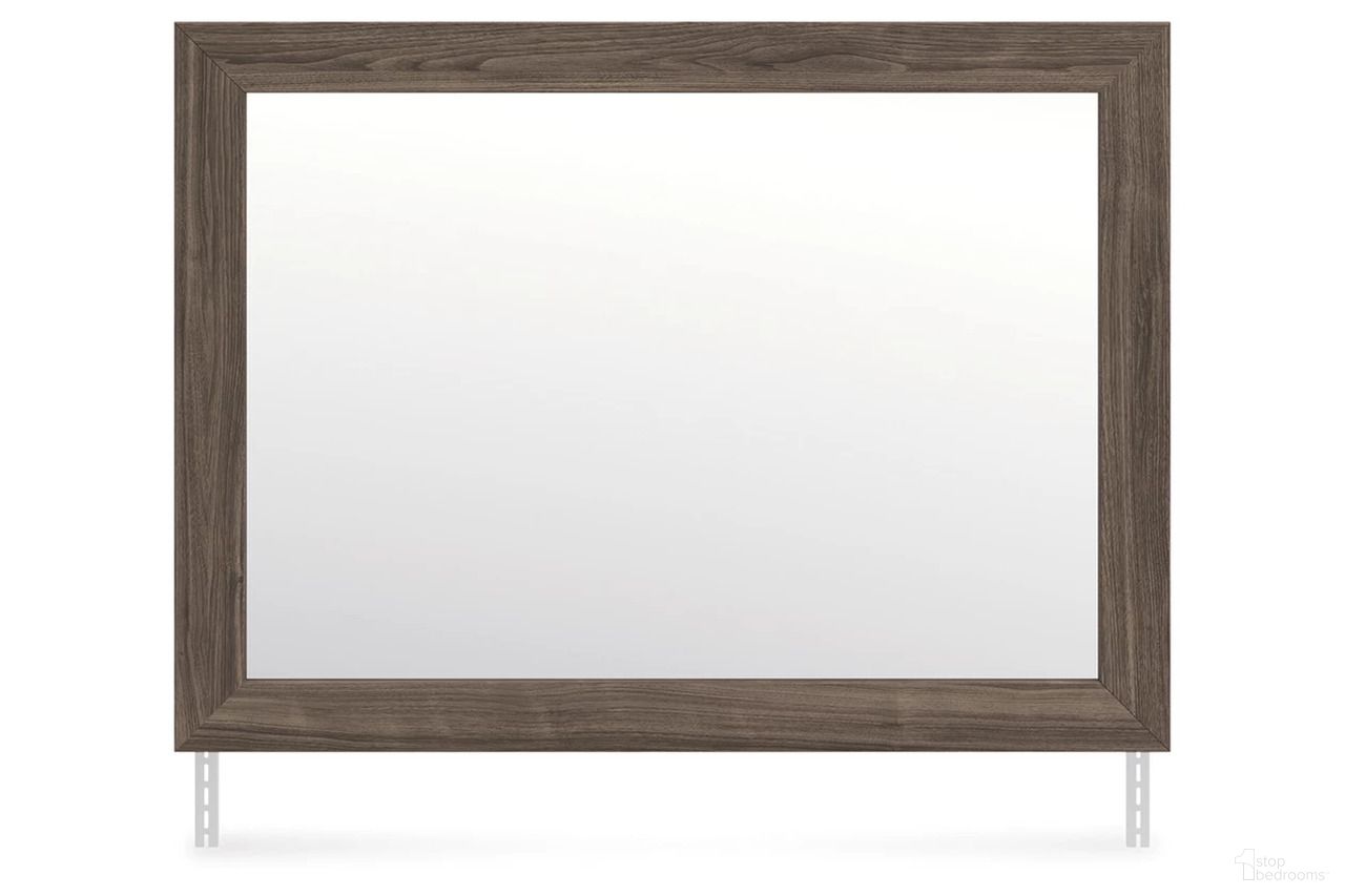 The appearance of Nendalane Bedroom Mirror In Brown designed by Signature Design by Ashley in the modern / contemporary interior design. This brown piece of furniture  was selected by 1StopBedrooms from Nendalane Collection to add a touch of cosiness and style into your home. Sku: NCB1108-36. Material: Glass.