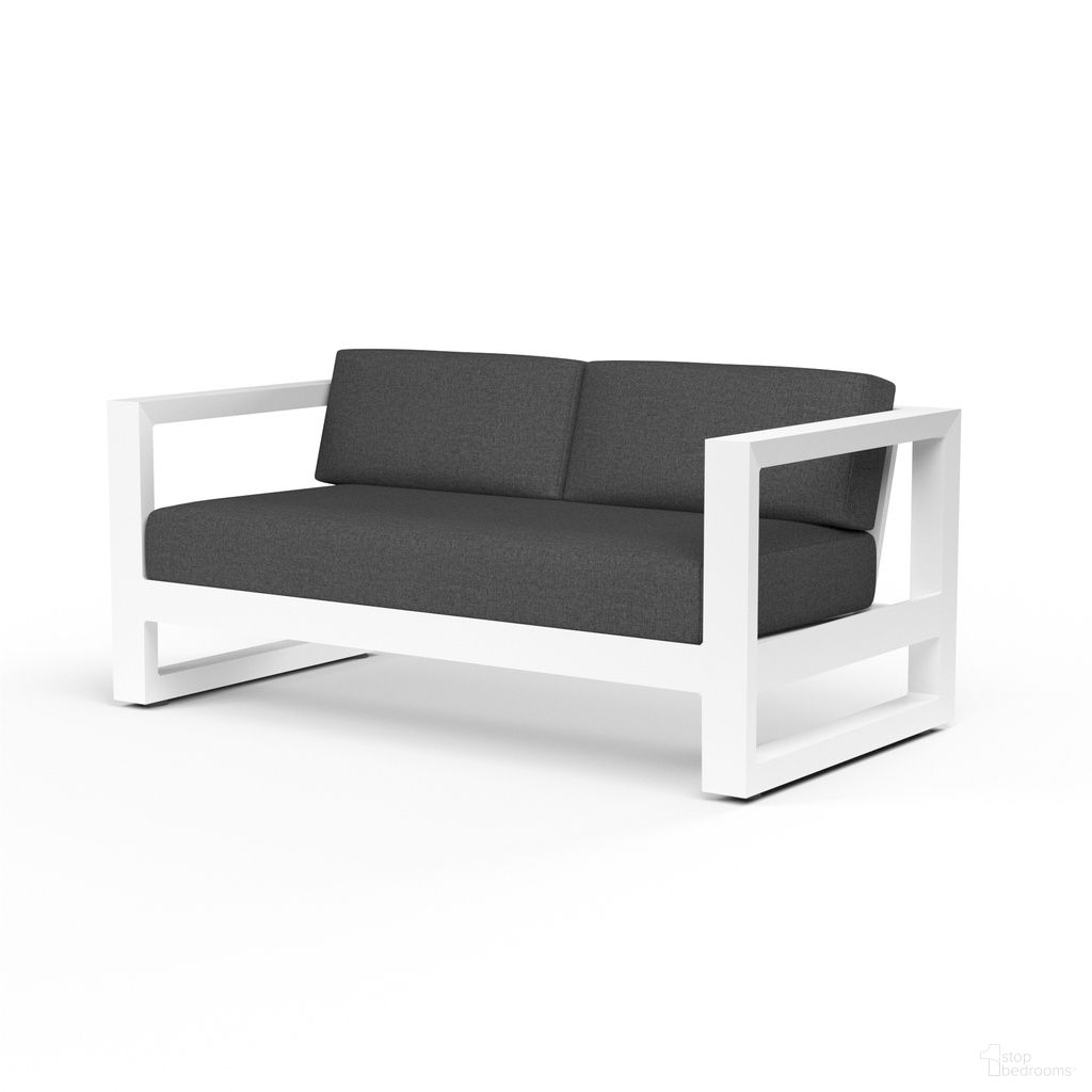 The appearance of Newport Loveseat in Spectrum Carbon designed by Sunset West in the modern / contemporary interior design. This spectrum carbon piece of furniture was selected by 1StopBedrooms from Newport Collection to add a touch of cosiness and style into your home. Sku: SW4801-22-48085. Material: Aluminum.