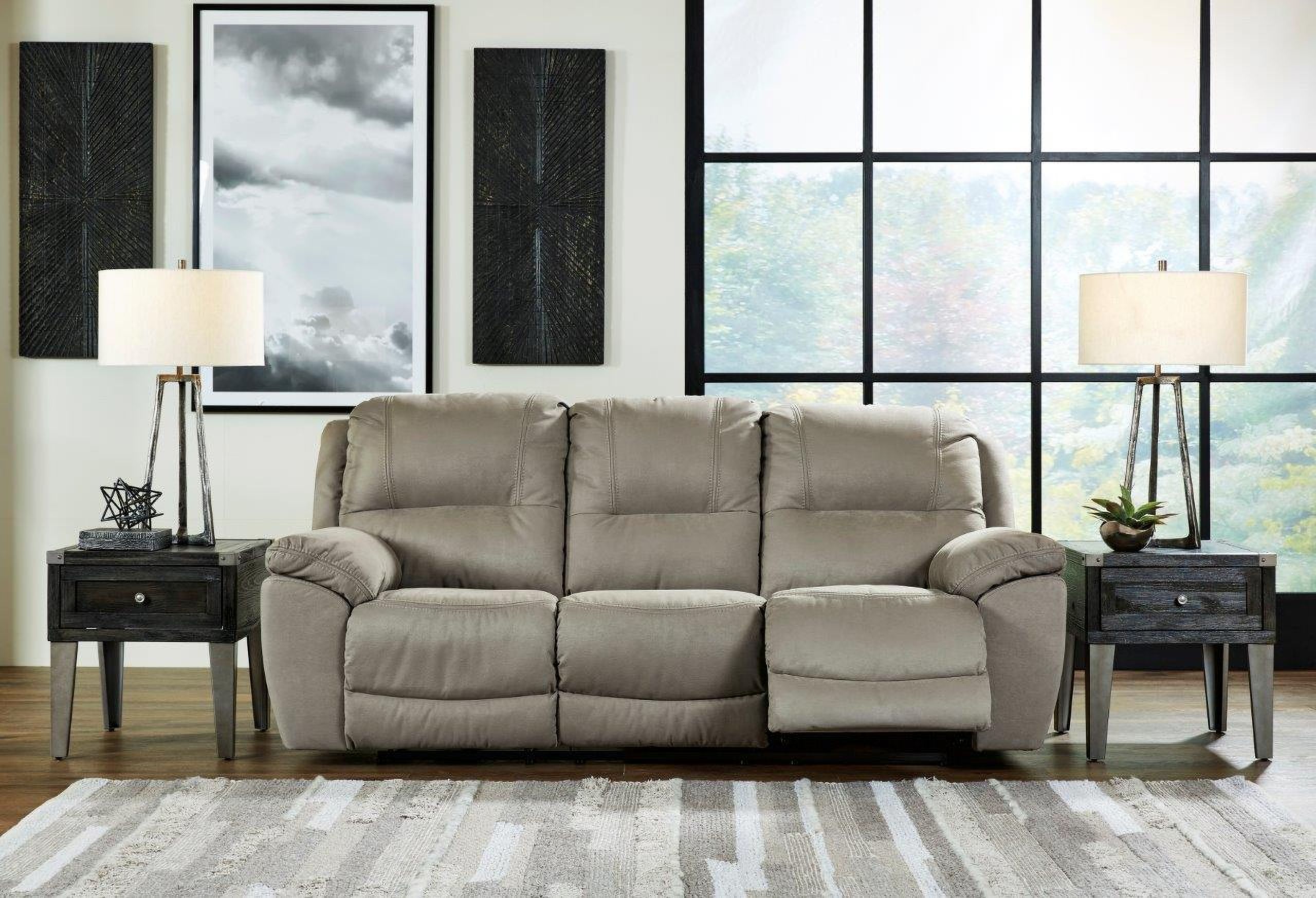 The appearance of Next-Gen Gaucho Reclining Sofa In Putty designed by Signature Design by Ashley in the modern / contemporary interior design. This putty piece of furniture was selected by 1StopBedrooms from Next-Gen Gaucho Collection to add a touch of cosiness and style into your home. Sku: 5420388. Material: Leather.
