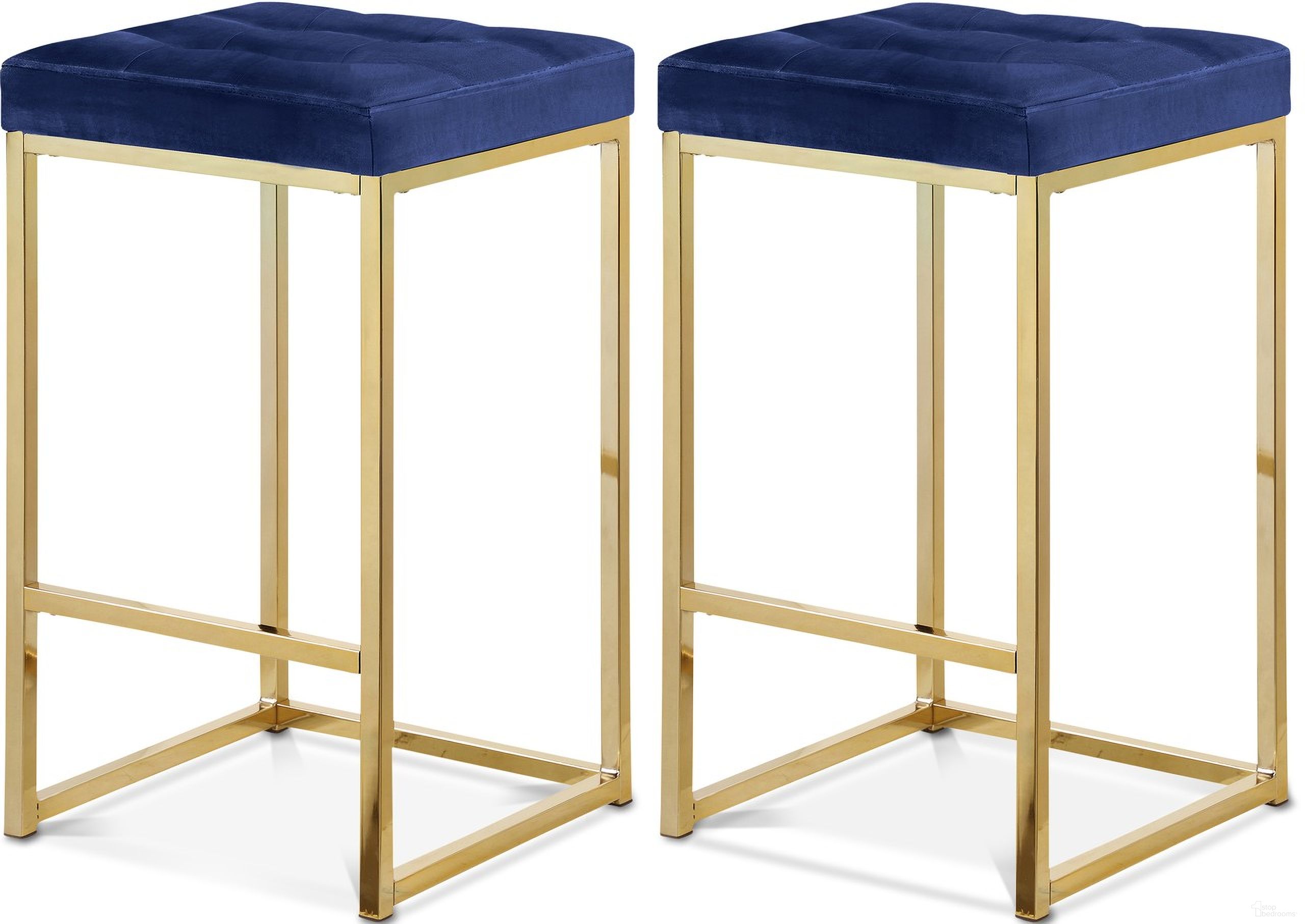 The appearance of Nicola Velvet Stool Set of 2 In Navy and Gold designed by Meridian in the modern / contemporary interior design. This navy piece of furniture  was selected by 1StopBedrooms from Nicola Collection to add a touch of cosiness and style into your home. Sku: 906Navy-C. Material: Velvet.