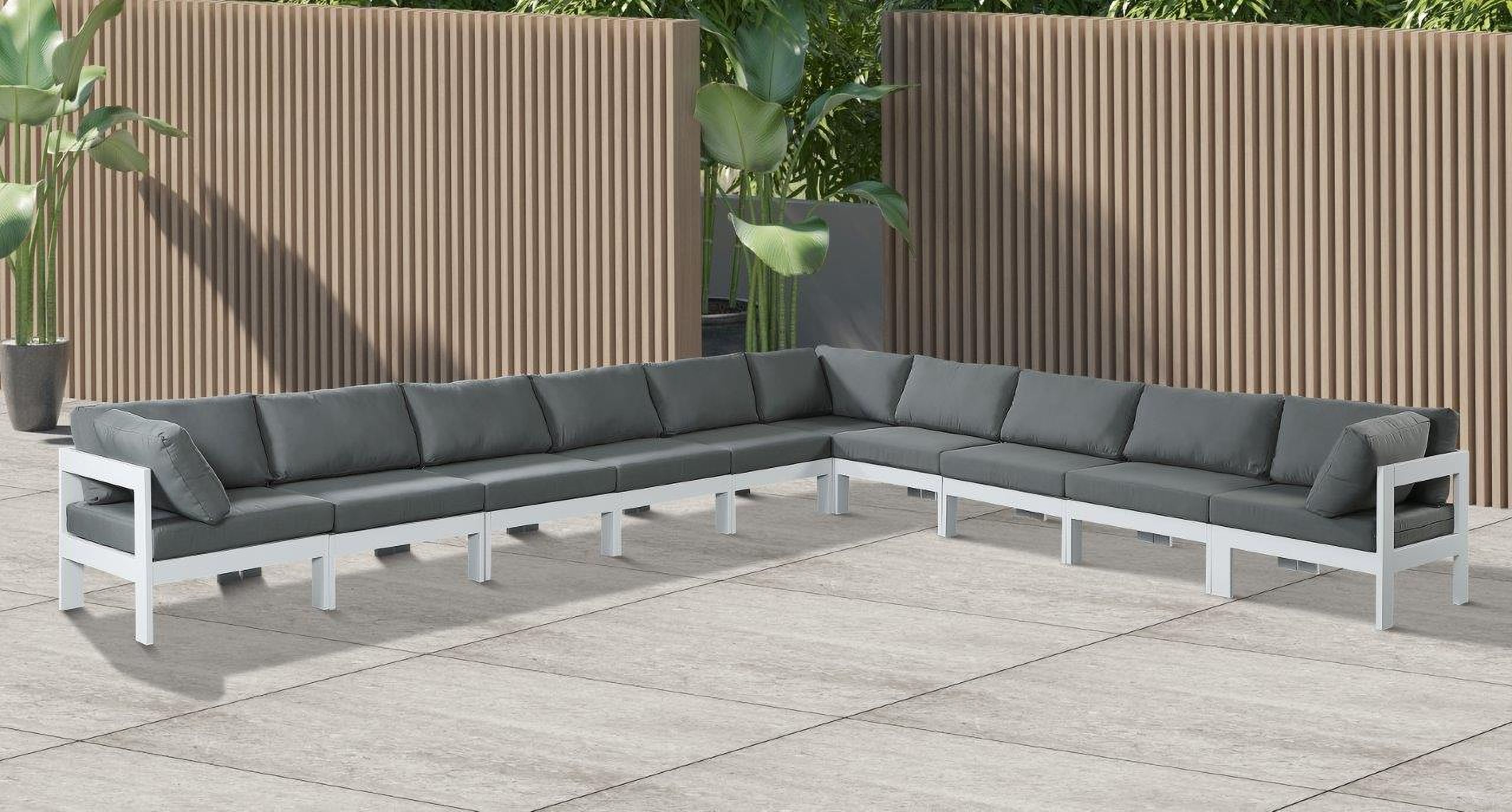 The appearance of Nizuc Water Resistant Fabric Outdoor Patio 10 Piece Modular Sectional In Grey designed by Meridian in the modern / contemporary interior design. This grey piece of furniture was selected by 1StopBedrooms from Nizuc Collection to add a touch of cosiness and style into your home. Sku: 375Grey-Corner;375Grey-Corner;375Grey-Corner;375Grey-Armless;375Grey-Armless;375Grey-Armless;375Grey-Armless;375Grey-Armless;375Grey-Armless;375Grey-Armless. Material: Aluminum.