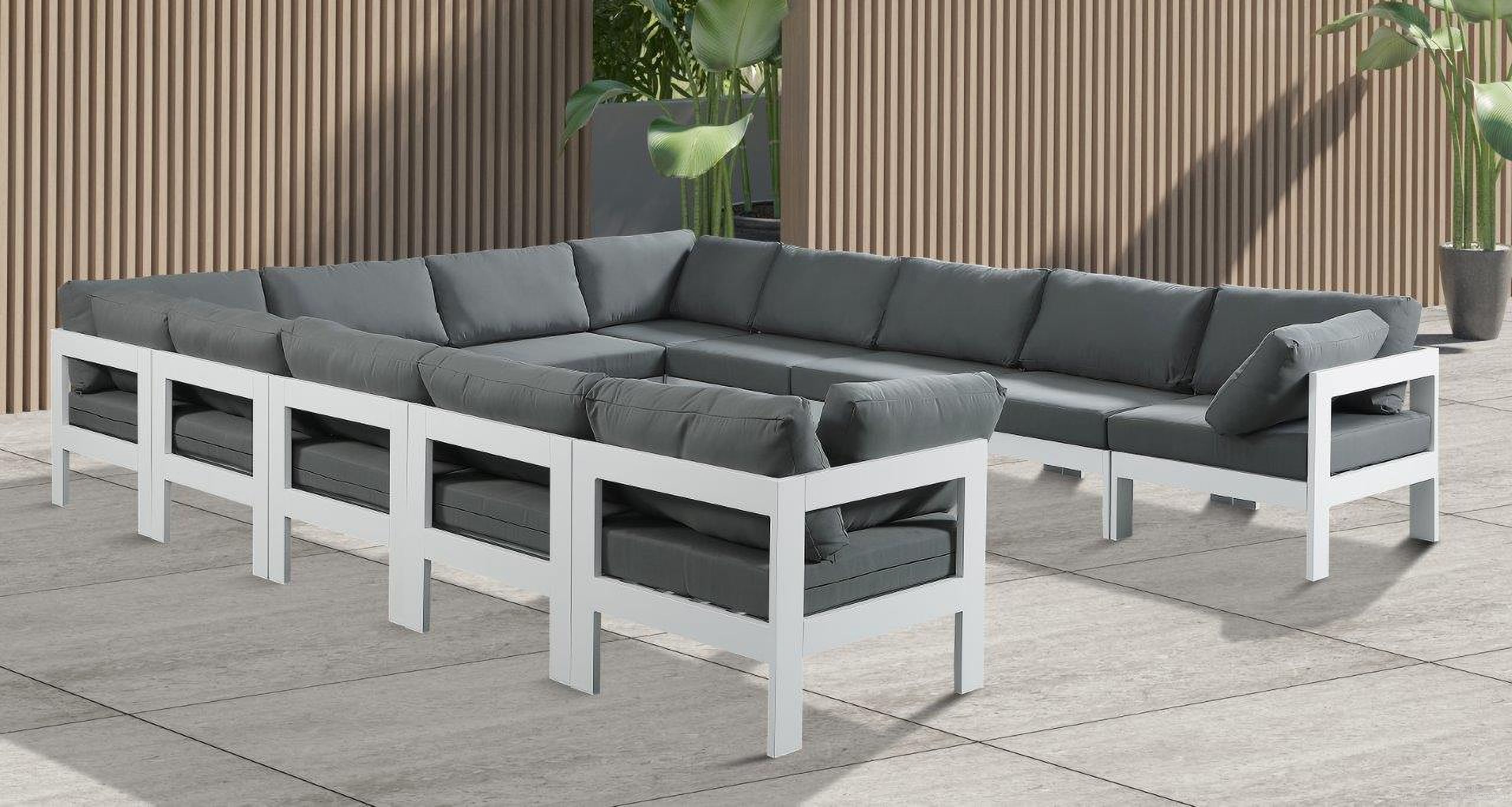 The appearance of Nizuc Water Resistant Fabric Outdoor Patio 12 Piece Modular Sectional In Grey designed by Meridian in the modern / contemporary interior design. This grey piece of furniture was selected by 1StopBedrooms from Nizuc Collection to add a touch of cosiness and style into your home. Sku: 375Grey-Corner;375Grey-Corner;375Grey-Corner;375Grey-Corner;375Grey-Armless;375Grey-Armless;375Grey-Armless;375Grey-Armless;375Grey-Armless;375Grey-Armless;375Grey-Armless;375Grey-Armless. Material: Aluminum.