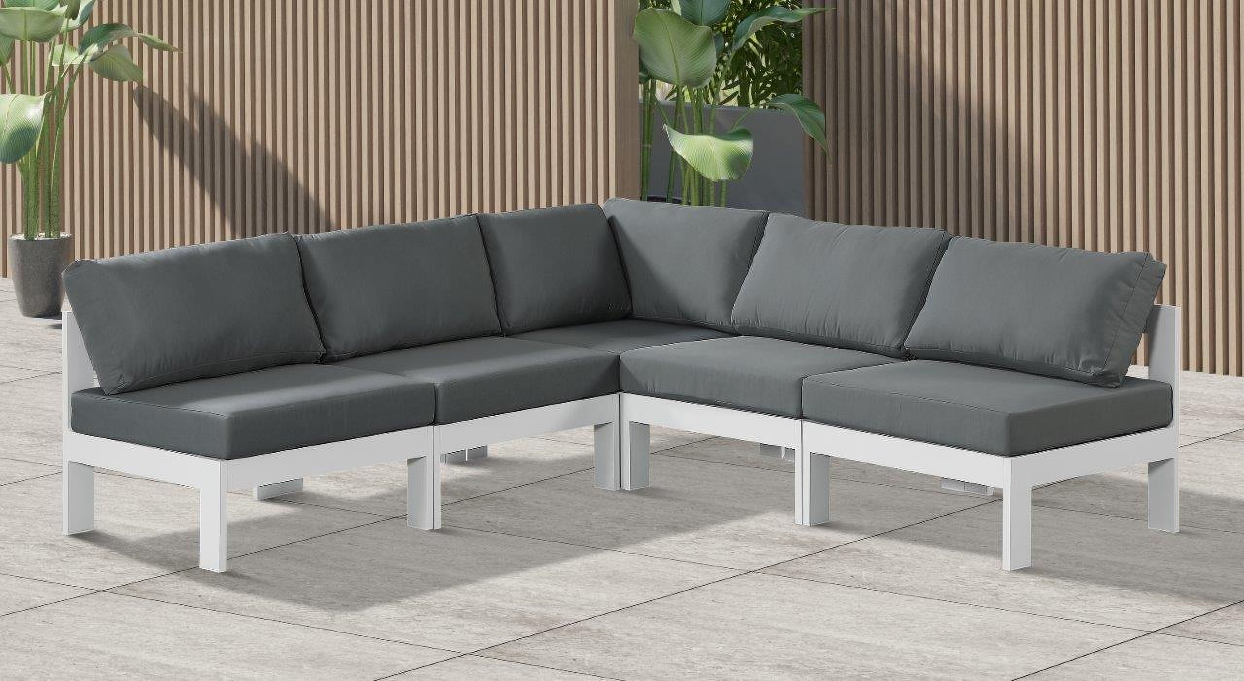 The appearance of Nizuc Water Resistant Fabric Outdoor Patio 5 Piece Modular Sectional In Grey designed by Meridian in the modern / contemporary interior design. This grey piece of furniture was selected by 1StopBedrooms from Nizuc Collection to add a touch of cosiness and style into your home. Sku: 375Grey-Corner;375Grey-Armless;375Grey-Armless;375Grey-Armless;375Grey-Armless. Material: Aluminum.