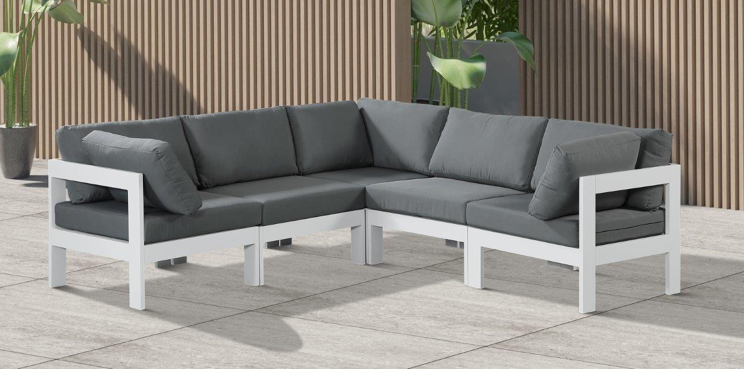 The appearance of Nizuc Water Resistant Fabric Outdoor Patio 5 Piece Modular Sectional In Grey designed by Meridian in the modern / contemporary interior design. This grey piece of furniture  was selected by 1StopBedrooms from Nizuc Collection to add a touch of cosiness and style into your home. Sku: 375Grey-Corner;375Grey-Corner;375Grey-Corner;375Grey-Armless;375Grey-Armless. Material: Aluminum.