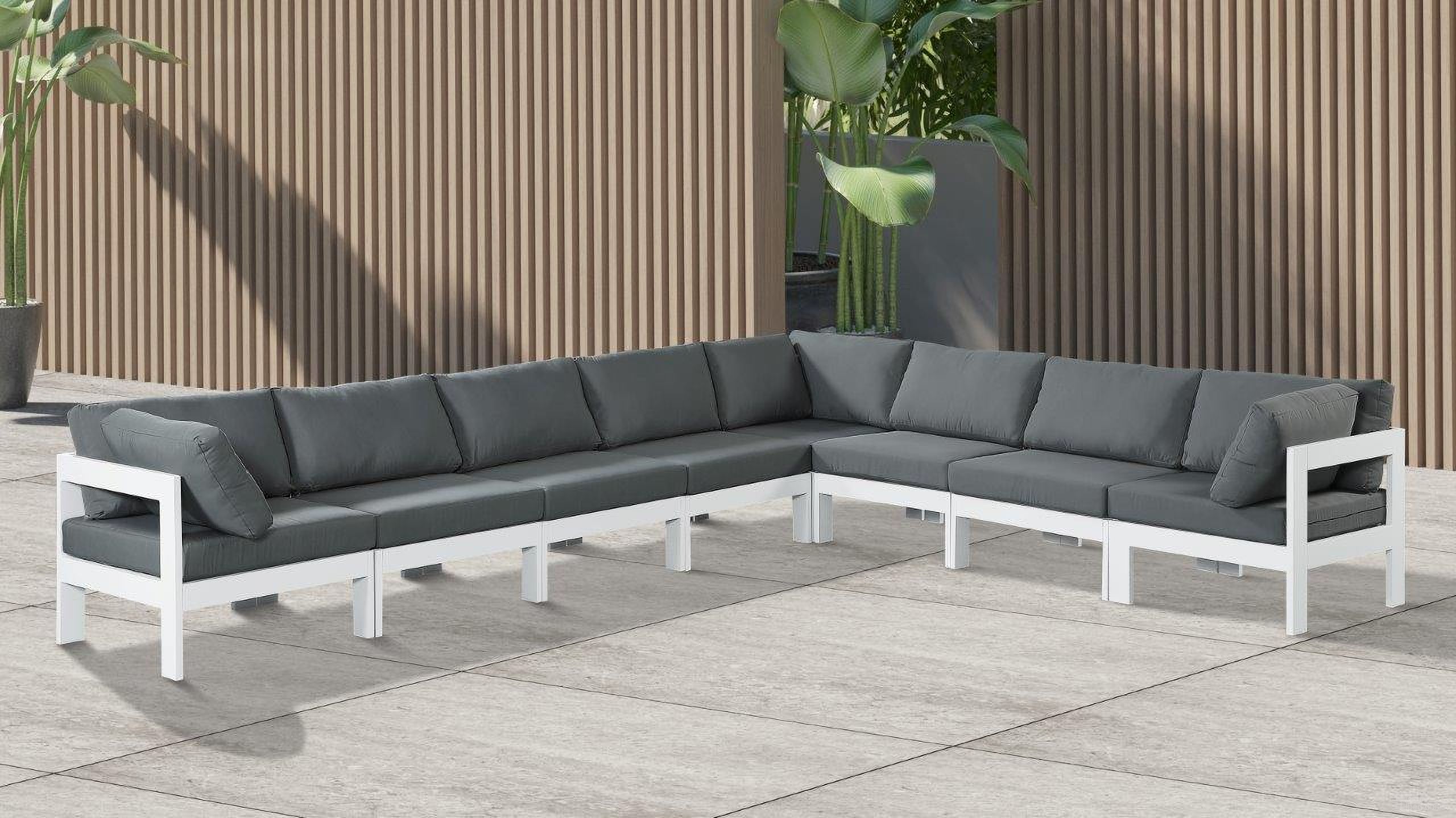 The appearance of Nizuc Water Resistant Fabric Outdoor Patio 8 Piece Modular Sectional In Grey designed by Meridian in the modern / contemporary interior design. This grey piece of furniture  was selected by 1StopBedrooms from Nizuc Collection to add a touch of cosiness and style into your home. Sku: 375Grey-Corner;375Grey-Corner;375Grey-Corner;375Grey-Armless;375Grey-Armless;375Grey-Armless;375Grey-Armless;375Grey-Armless. Material: Aluminum.