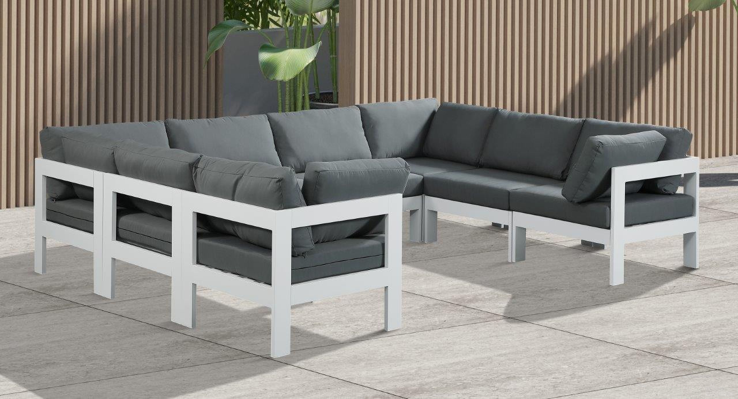 The appearance of Nizuc Water Resistant Fabric Outdoor Patio 8 Piece Modular Sectional In Grey designed by Meridian in the modern / contemporary interior design. This grey piece of furniture  was selected by 1StopBedrooms from Nizuc Collection to add a touch of cosiness and style into your home. Sku: 375Grey-Corner;375Grey-Corner;375Grey-Corner;375Grey-Corner;375Grey-Armless;375Grey-Armless;375Grey-Armless;375Grey-Armless. Material: Aluminum.
