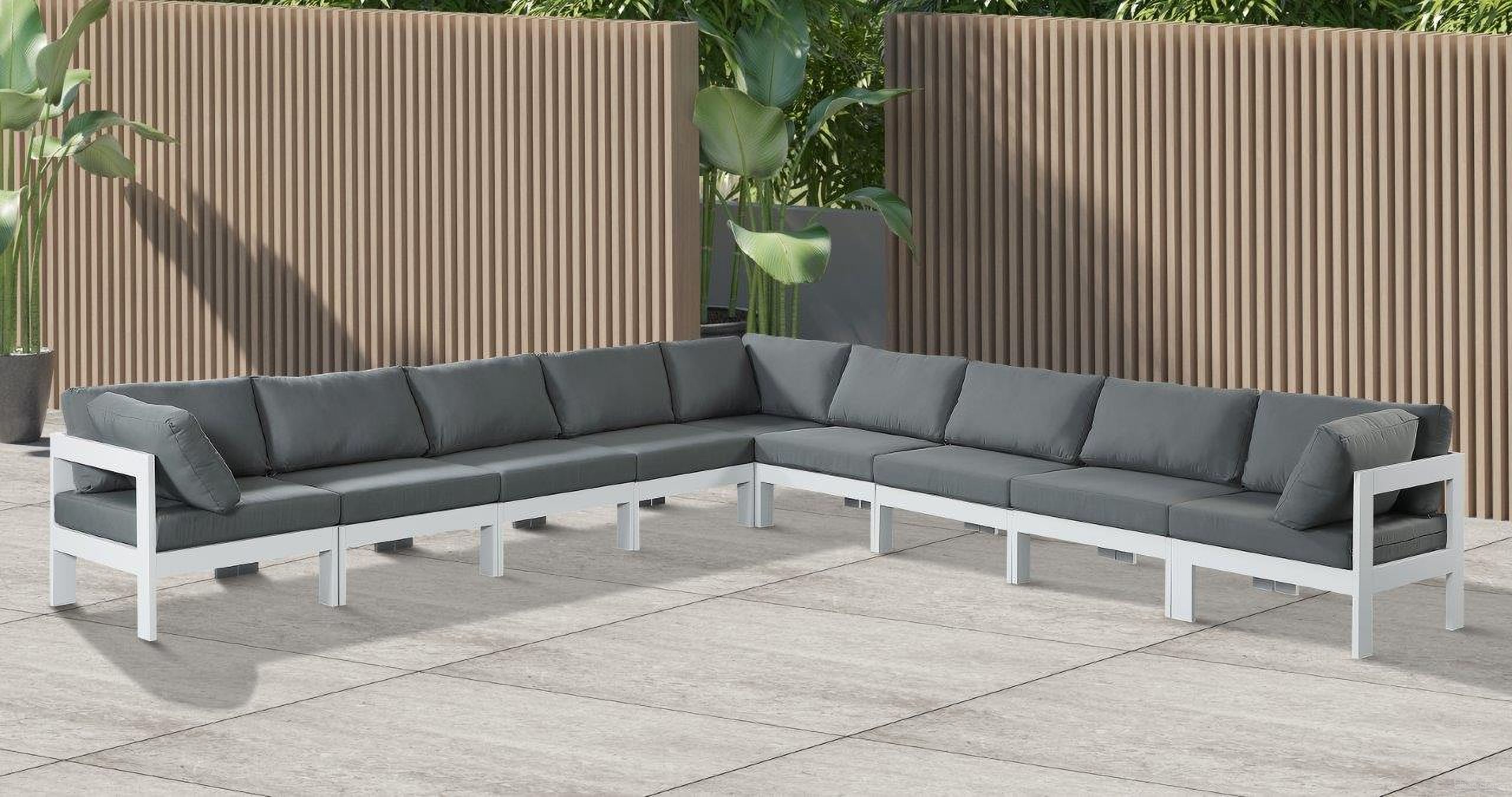 The appearance of Nizuc Water Resistant Fabric Outdoor Patio 9 Piece Modular Sectional In Grey designed by Meridian in the modern / contemporary interior design. This grey piece of furniture  was selected by 1StopBedrooms from Nizuc Collection to add a touch of cosiness and style into your home. Sku: 375Grey-Corner;375Grey-Corner;375Grey-Corner;375Grey-Armless;375Grey-Armless;375Grey-Armless;375Grey-Armless;375Grey-Armless;375Grey-Armless. Material: Aluminum.