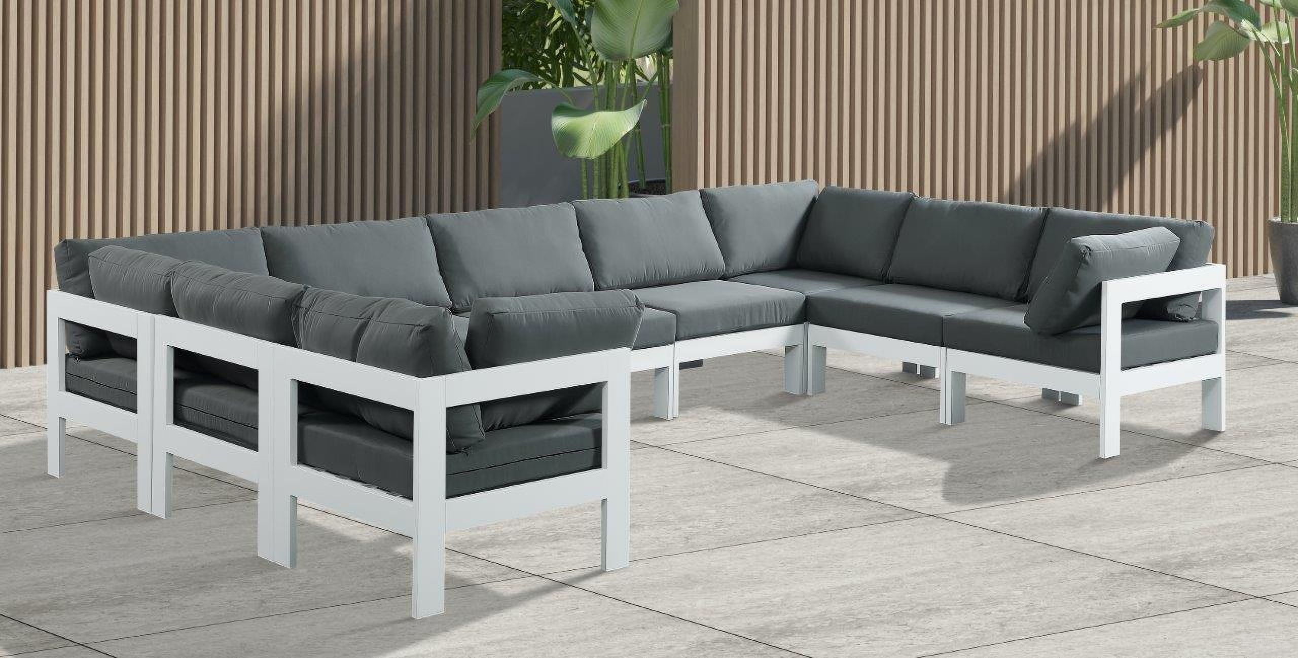 The appearance of Nizuc Water Resistant Fabric Outdoor Patio 9 Piece Modular Sectional In Grey designed by Meridian in the modern / contemporary interior design. This grey piece of furniture  was selected by 1StopBedrooms from Nizuc Collection to add a touch of cosiness and style into your home. Sku: 375Grey-Corner;375Grey-Corner;375Grey-Corner;375Grey-Corner;375Grey-Armless;375Grey-Armless;375Grey-Armless;375Grey-Armless;375Grey-Armless. Material: Aluminum.