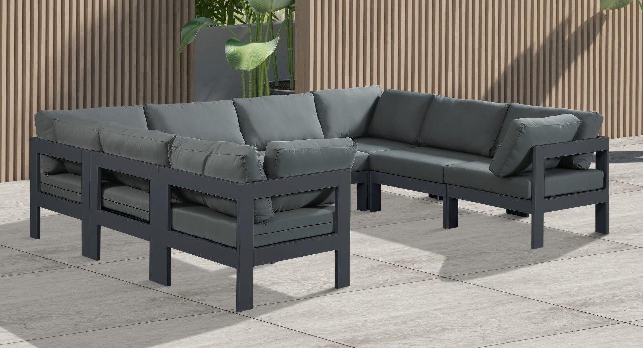 The appearance of Nizuc Water Resistant Fabric Outdoor Patio 8 Piece Modular Sectional In Grey designed by Meridian in the modern / contemporary interior design. This grey piece of furniture  was selected by 1StopBedrooms from Nizuc Collection to add a touch of cosiness and style into your home. Sku: 376Grey-Corner;376Grey-Corner;376Grey-Corner;376Grey-Corner;376Grey-Armless;376Grey-Armless;376Grey-Armless;376Grey-Armless. Material: Aluminum.
