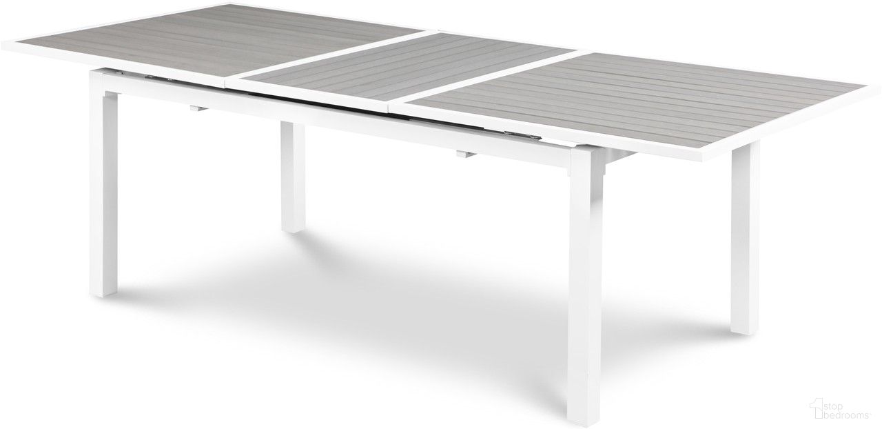 The appearance of Nizuc Wood Look Accent Paneling Outdoor Patio Extendable Aluminum Dining Table In Grey designed by Meridian in the modern / contemporary interior design. This grey piece of furniture was selected by 1StopBedrooms from Nizuc Collection to add a touch of cosiness and style into your home. Sku: 366-T. Table Base Style: Legs. Material: Aluminum. Table Top Shape: Rectangular.