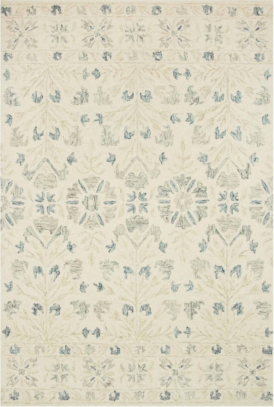 The appearance of Norabel Ivory/Grey Rug NORBNOR-02IVGY93D0 designed by Loloi Rugs in the modern / contemporary interior design. This ivory and grey piece of furniture was selected by 1StopBedrooms from Norabel Collection to add a touch of cosiness and style into your home. Sku: NORBNOR-02IVGY93D0. Material: Wool.