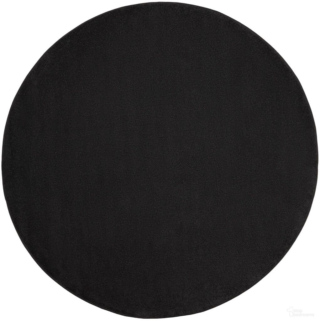 The appearance of Nourison Essentials 10' x 10' Round Outdoor Rug In Black designed by Nourison in the transitional interior design. This black piece of furniture  was selected by 1StopBedrooms from Essentials Collection to add a touch of cosiness and style into your home. Sku: 99446062055. Material: Polypropylene.