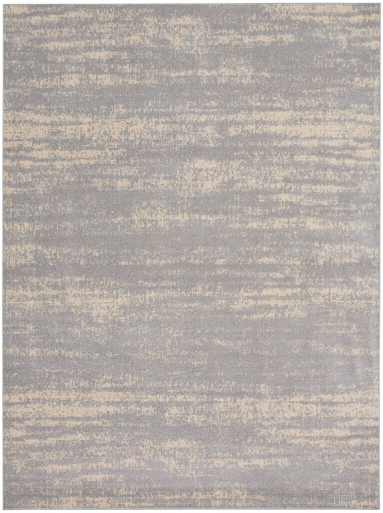 The appearance of Nourison Essentials 10' x 14' Rug In Grey and Beige designed by Nourison in the modern / contemporary interior design. This grey and beige piece of furniture  was selected by 1StopBedrooms from Essentials Collection to add a touch of cosiness and style into your home. Sku: 99446149527. Material: Polypropylene.