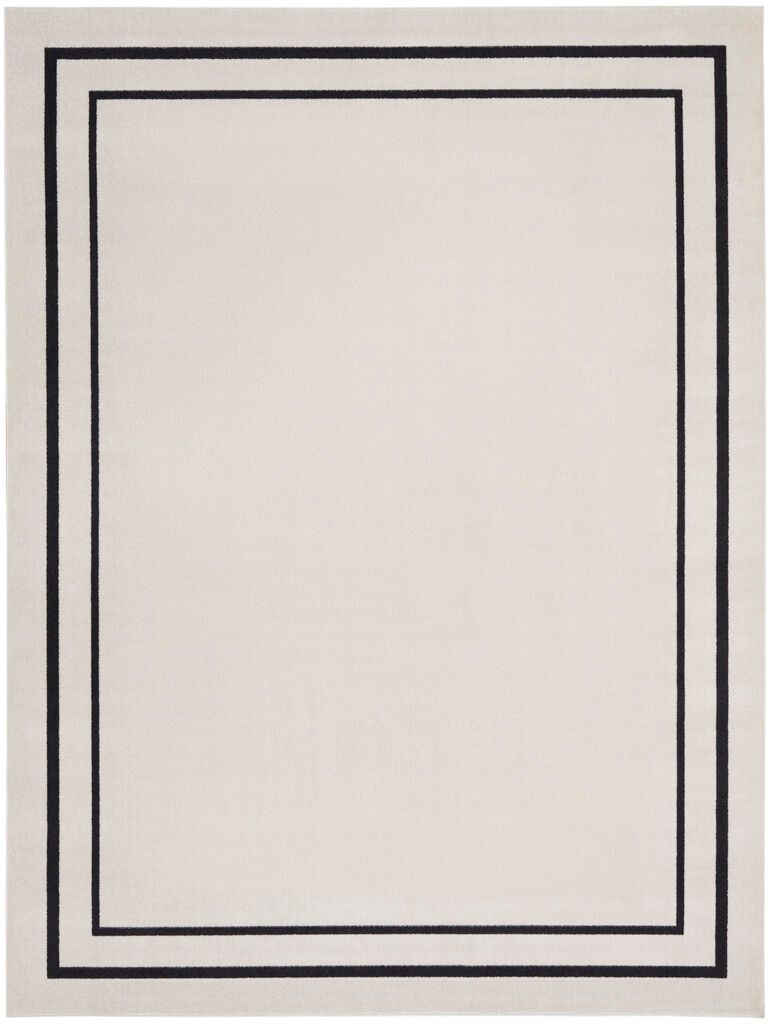 The appearance of Nourison Essentials 10' x 14' Rug In Ivory and Black designed by Nourison in the modern / contemporary interior design. This ivory/black piece of furniture  was selected by 1StopBedrooms from Essentials Collection to add a touch of cosiness and style into your home. Sku: 99446148414. Material: Polypropylene.