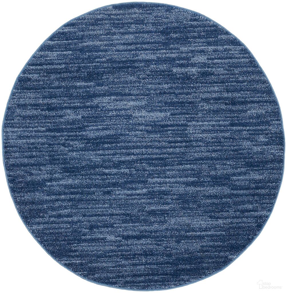 The appearance of Nourison Essentials 4' x 4' Round Outdoor Rug In Navy Blue designed by Nourison in the transitional interior design. This navy blue piece of furniture  was selected by 1StopBedrooms from Essentials Collection to add a touch of cosiness and style into your home. Sku: 99446824523. Material: Polypropylene.