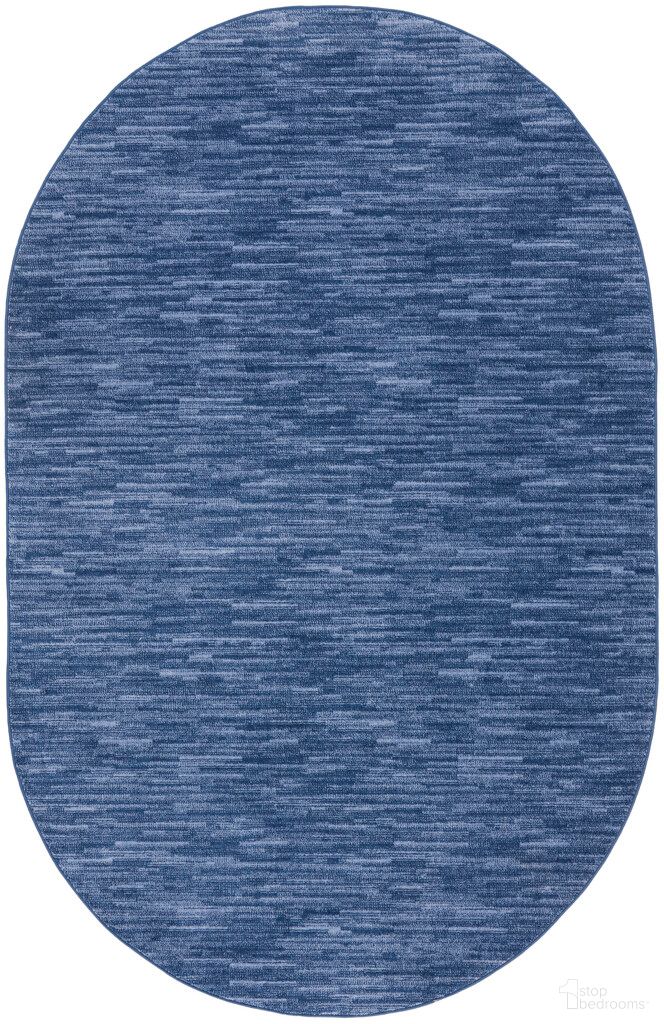 The appearance of Nourison Essentials 6' x 9' Oval Outdoor Rug In Navy Blue designed by Nourison in the transitional interior design. This navy blue piece of furniture was selected by 1StopBedrooms from Essentials Collection to add a touch of cosiness and style into your home. Sku: 99446072870. Material: Polypropylene.