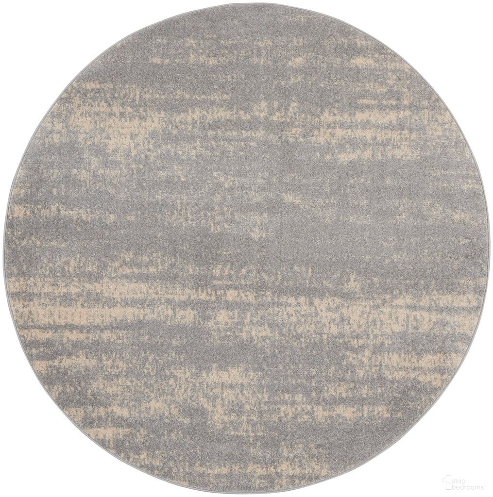 The appearance of Nourison Essentials 8' x 8' Round Rug In Grey and Beige designed by Nourison in the modern / contemporary interior design. This grey and beige piece of furniture  was selected by 1StopBedrooms from Essentials Collection to add a touch of cosiness and style into your home. Sku: 99446149435. Material: Polypropylene.