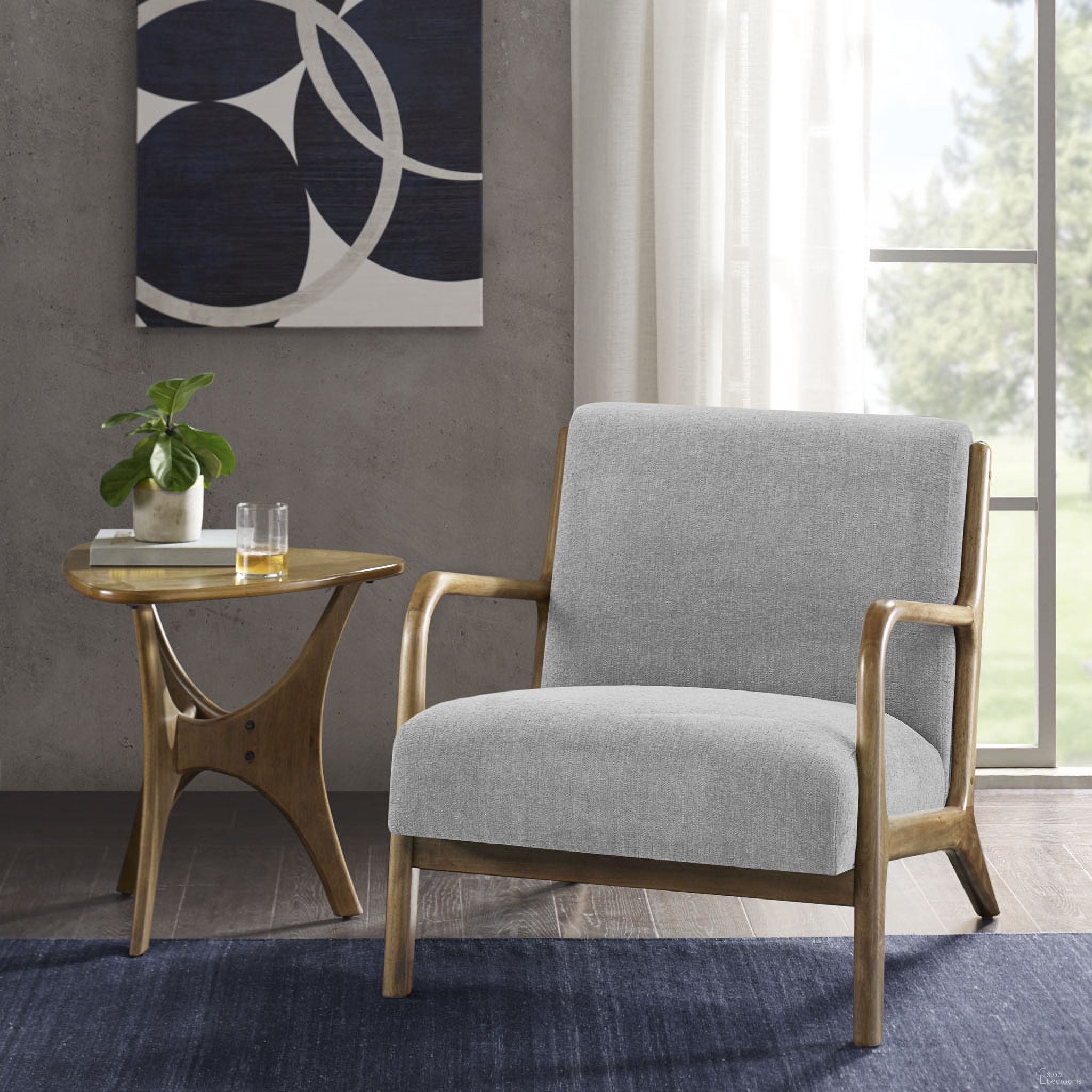 The appearance of Novak Lounge Chair In Grey designed by Olliix in the transitional interior design. This grey piece of furniture was selected by 1StopBedrooms from Novak Collection to add a touch of cosiness and style into your home. Sku: II100-0435. Material: Wood.