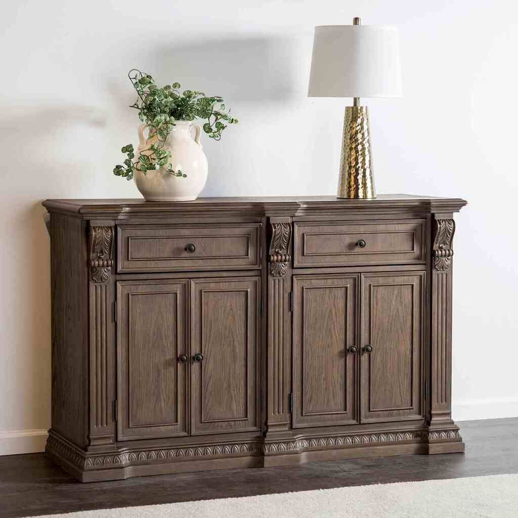 The appearance of Oakham Side Board In Weathered Oak designed by Furniture of America in the rustic / southwestern interior design. This weathered oak piece of furniture was selected by 1StopBedrooms from Oakham Collection to add a touch of cosiness and style into your home. Sku: FM3418AK-SV. Material: Solid Wood.
