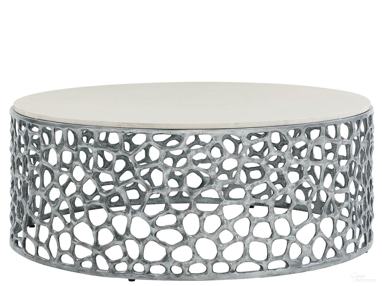 The appearance of Oasis Coral Cocktail Table In Gray designed by Universal in the modern / contemporary interior design. This gray piece of furniture was selected by 1StopBedrooms from Oasis Collection to add a touch of cosiness and style into your home. Sku: U533801N. Material: Aluminum.