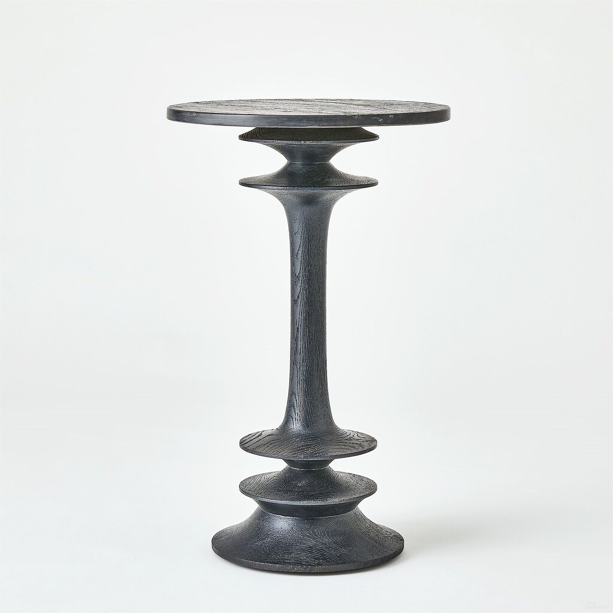 The appearance of Oasis Large Side Table In Black designed by Global Views in the modern / contemporary interior design. This black piece of furniture  was selected by 1StopBedrooms from Oasis Collection to add a touch of cosiness and style into your home. Sku: 993935. Material: Wood.
