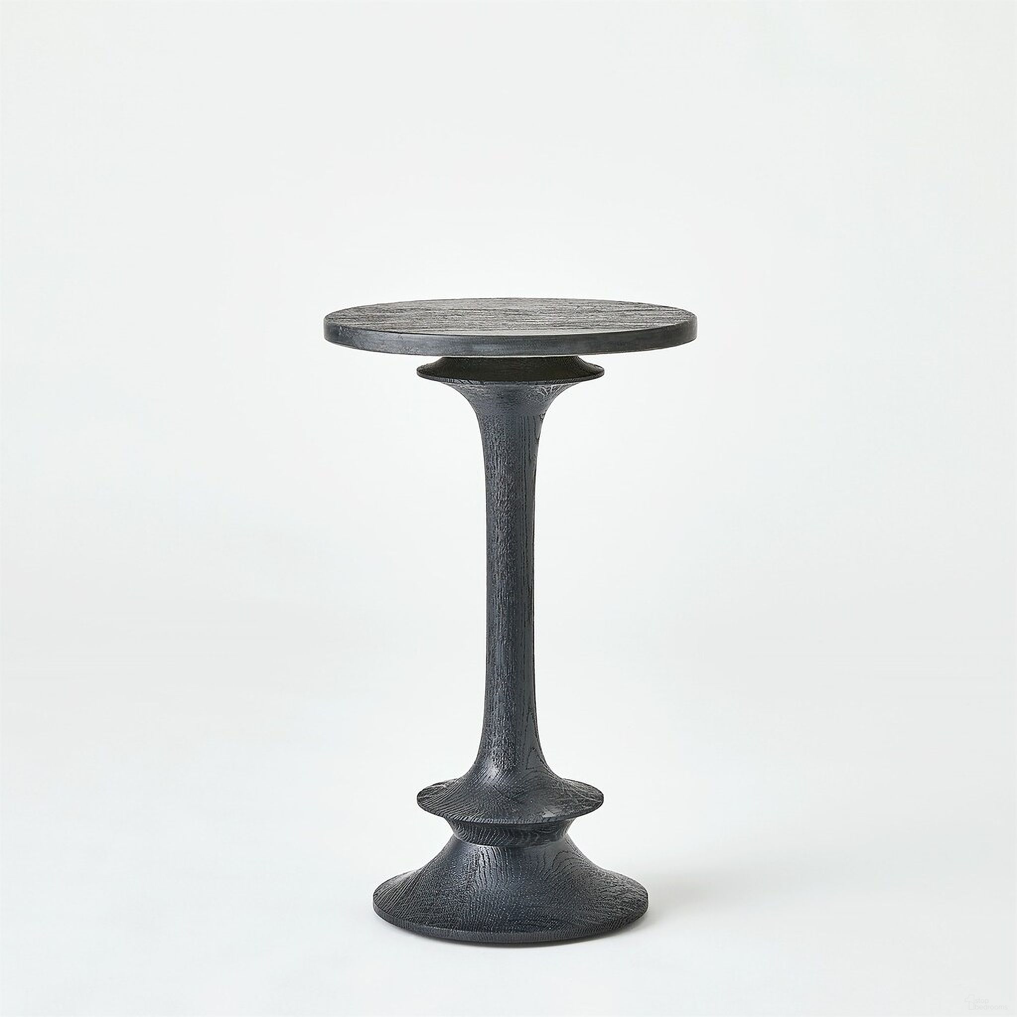 The appearance of Oasis Small Side Table In Black designed by Global Views in the modern / contemporary interior design. This black piece of furniture  was selected by 1StopBedrooms from Oasis Collection to add a touch of cosiness and style into your home. Sku: 993937. Material: Wood.