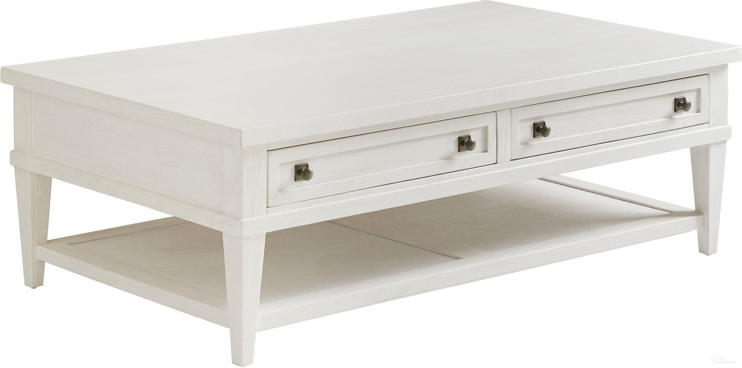The appearance of Ocean Breeze Palm Coast Rectangular Cocktail Table In Sand designed by Tommy Bahama in the transitional interior design. This sand piece of furniture  was selected by 1StopBedrooms from Ocean Breeze Collection to add a touch of cosiness and style into your home. Sku: 570-949. Material: Wood.