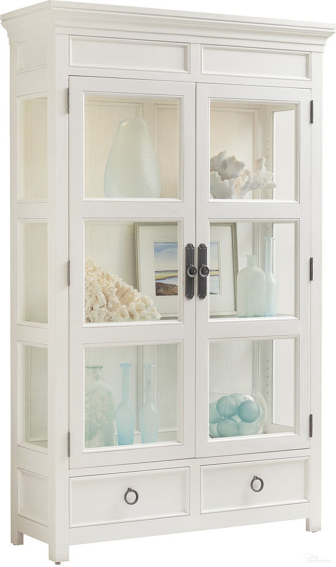 The appearance of Ocean Breeze Sanctuary Curio China In Sand designed by Tommy Bahama in the transitional interior design. This sand piece of furniture was selected by 1StopBedrooms from Ocean Breeze Collection to add a touch of cosiness and style into your home. Sku: 570-864. Material: Wood.