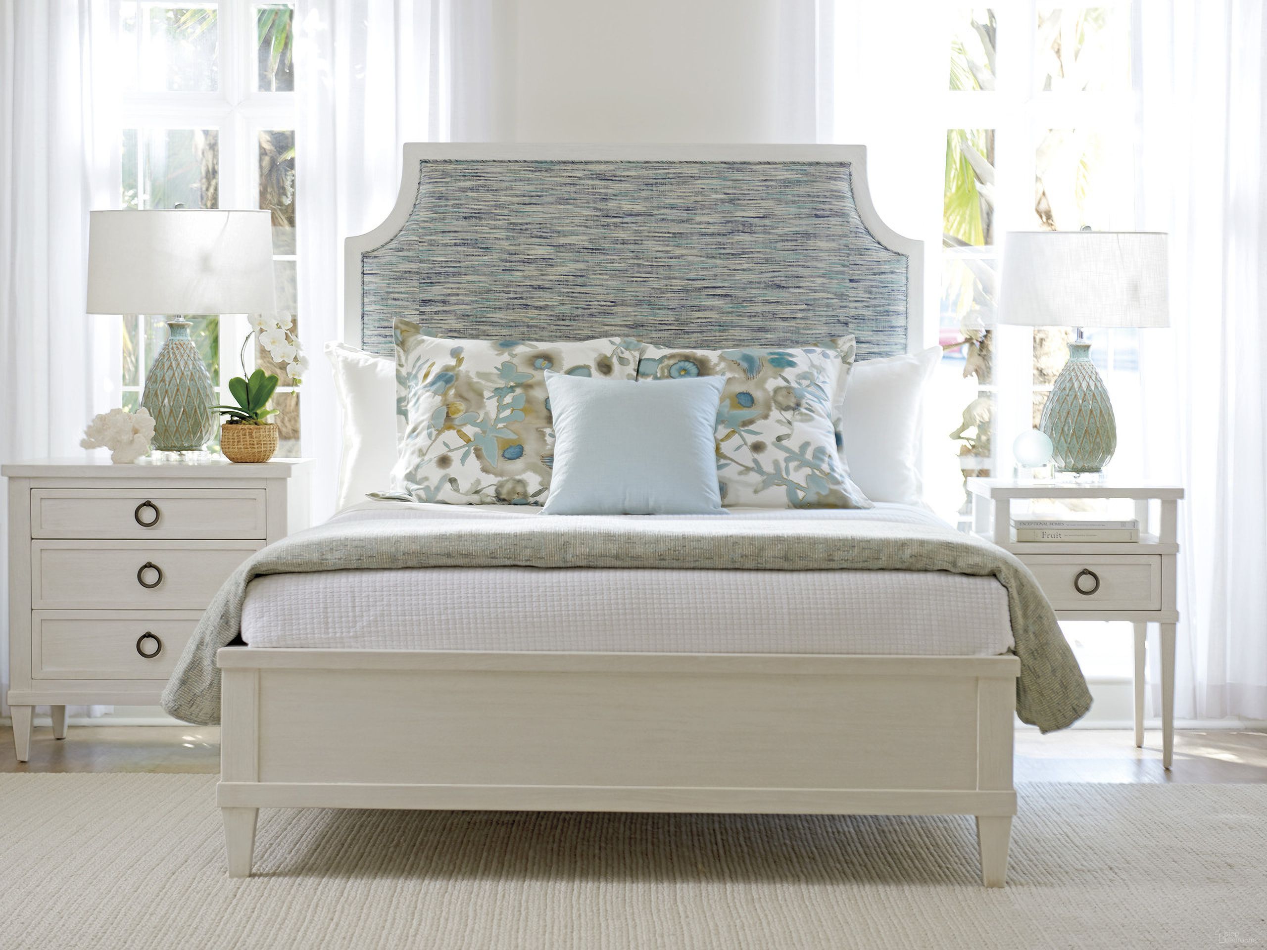 The appearance of Ocean Breeze Sand Belle Isle Upholstered Panel Bedroom Set designed by Tommy Bahama in the transitional interior design. This sand piece of furniture  was selected by 1StopBedrooms from Ocean Breeze Collection to add a touch of cosiness and style into your home. Sku: 570-153C;570-622. Bed Type: Panel Bed. Material: Wood. Bed Size: Queen.