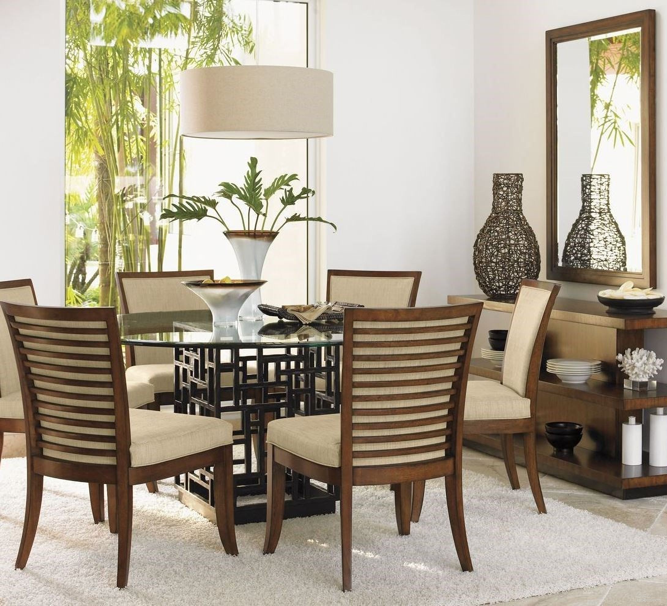 The appearance of Ocean Club 54 Inch South Seas Round Glass Dining Room Set designed by Tommy Bahama in the modern / contemporary interior design. This bali piece of furniture  was selected by 1StopBedrooms from Ocean Club Collection to add a touch of cosiness and style into your home. Sku: 536-875-54C;01-0536-880-01. Table Base Style: Pedestal. Table Top Shape: Round. Material: Rattan. Size: 54".