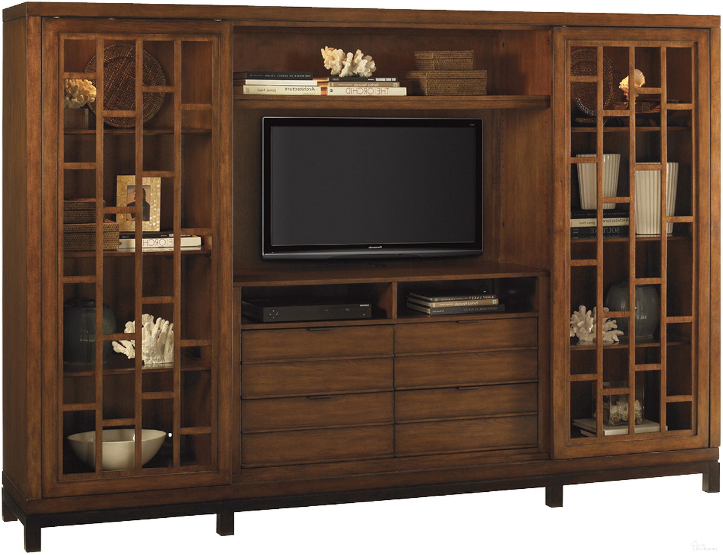 The appearance of Ocean Club Point Break Entertainment Chest In Bali designed by Tommy Bahama in the transitional interior design. This bali piece of furniture  was selected by 1StopBedrooms from Ocean Club Collection to add a touch of cosiness and style into your home. Sku: 536-912C. Material: Rattan.