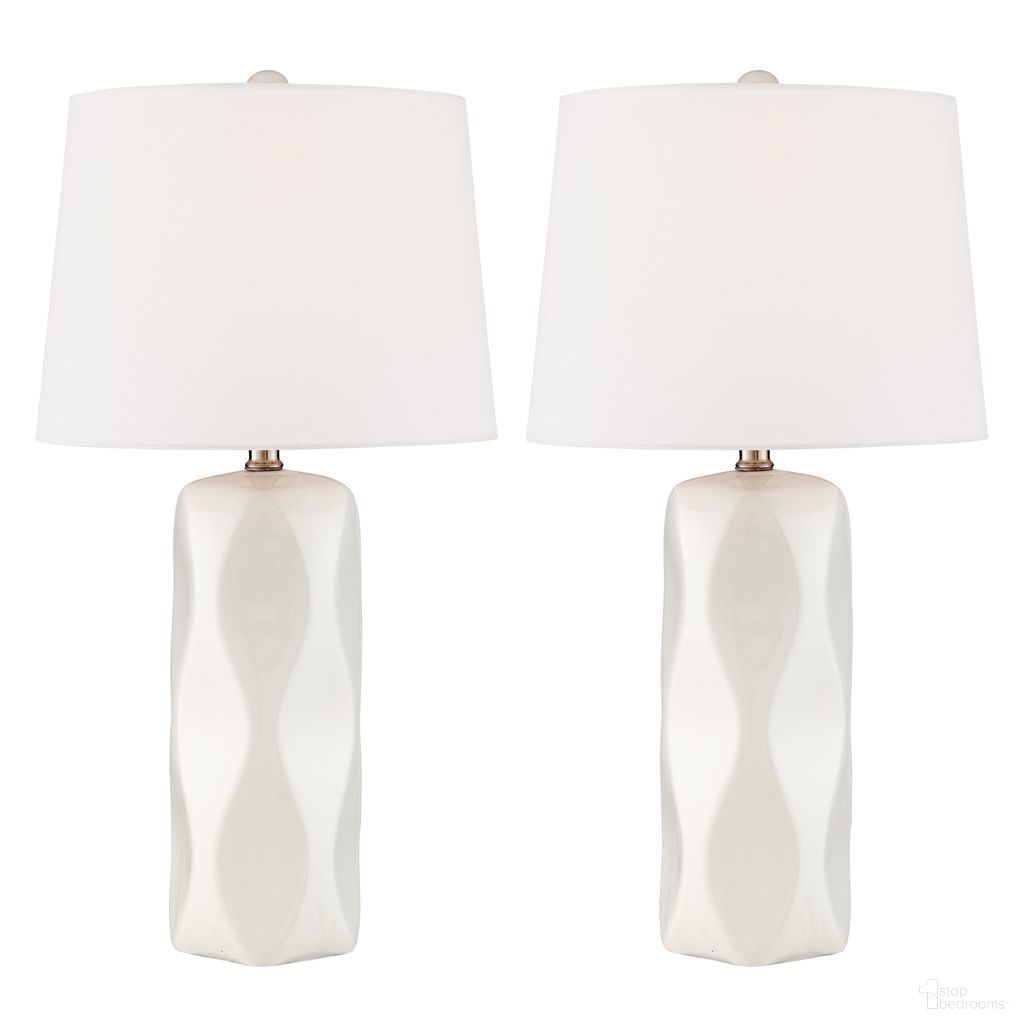 The appearance of Odelia Table Lamp Set of 2 In White designed by Lite Source in the modern / contemporary interior design. This white piece of furniture was selected by 1StopBedrooms from Odelia Collection to add a touch of cosiness and style into your home. Sku: LS-23583WHT/2PK. Material: Ceramic.