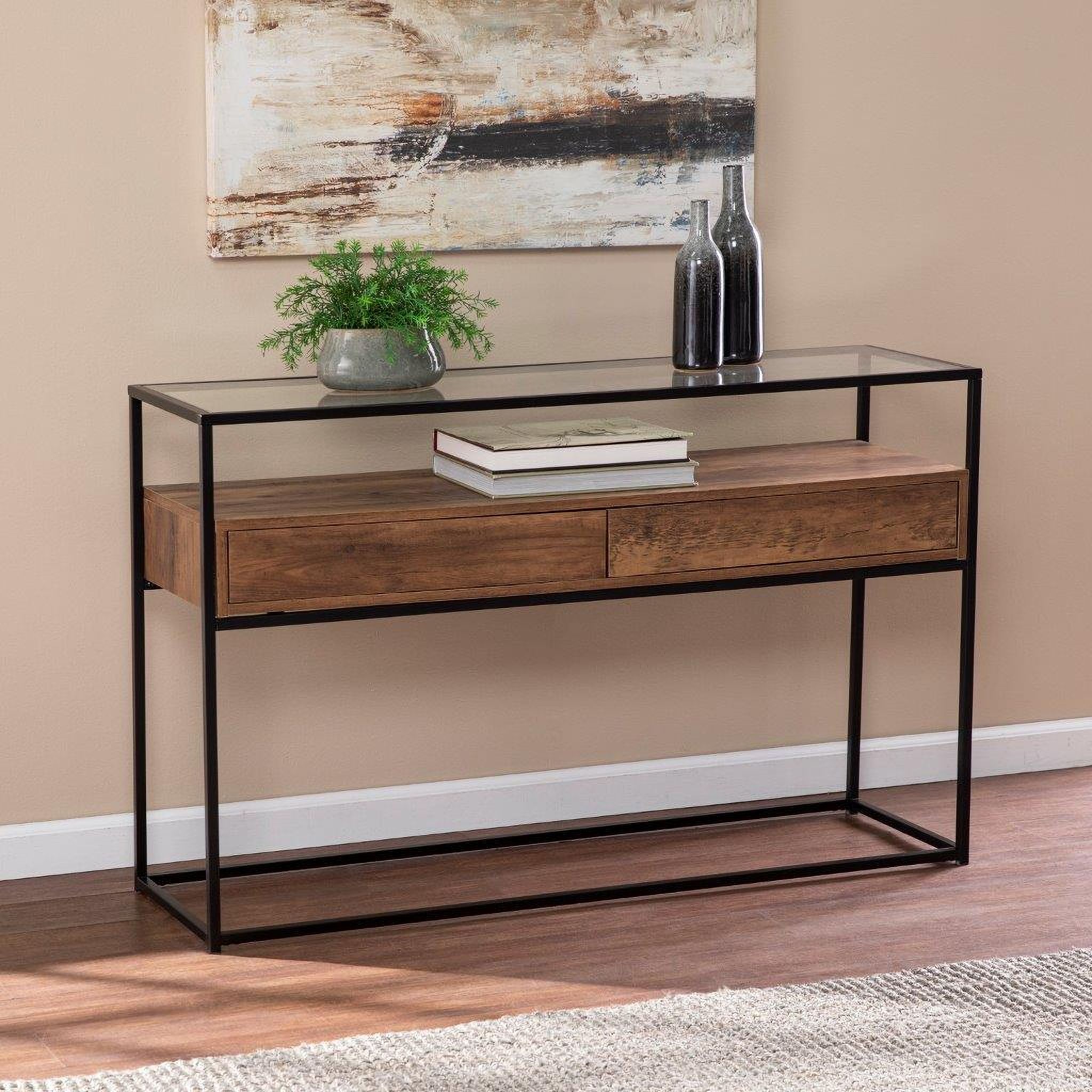 The appearance of Olivern Glass Top Console Table With Storage designed by SEI Furniture in the modern / contemporary interior design. This natural piece of furniture  was selected by 1StopBedrooms from Olivern Collection to add a touch of cosiness and style into your home. Sku: CM1014103. Material: Wood.