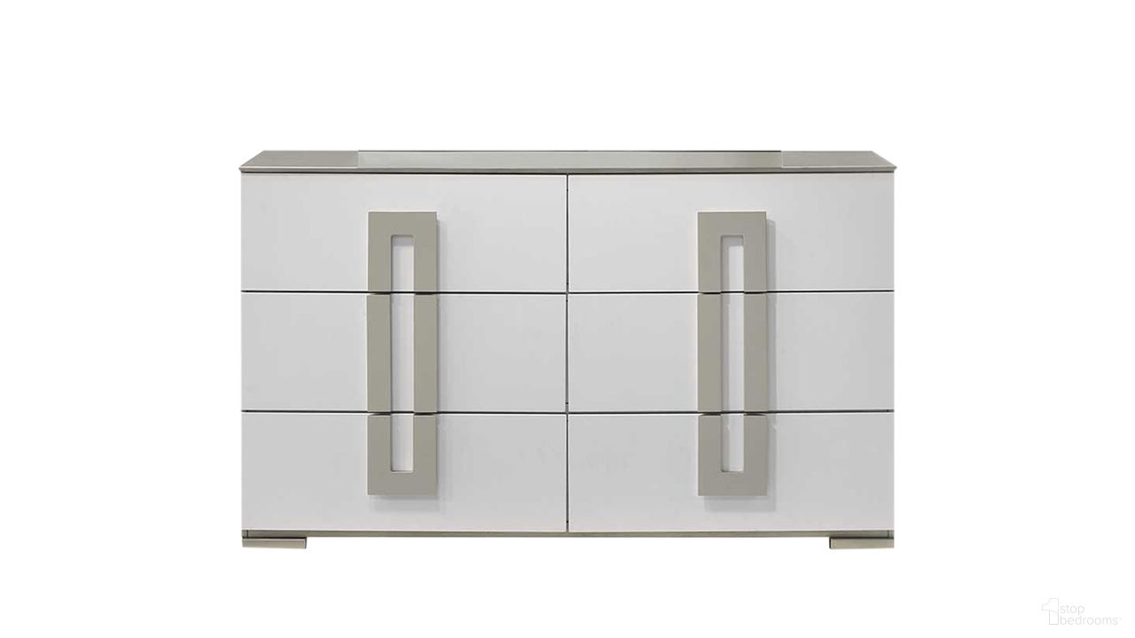 The appearance of Olivia Dresser In White designed by Galaxy Home Furnishings in the modern / contemporary interior design. This white piece of furniture was selected by 1StopBedrooms from Olivia Collection to add a touch of cosiness and style into your home. Sku: 601955554435. Material: Solid Wood.