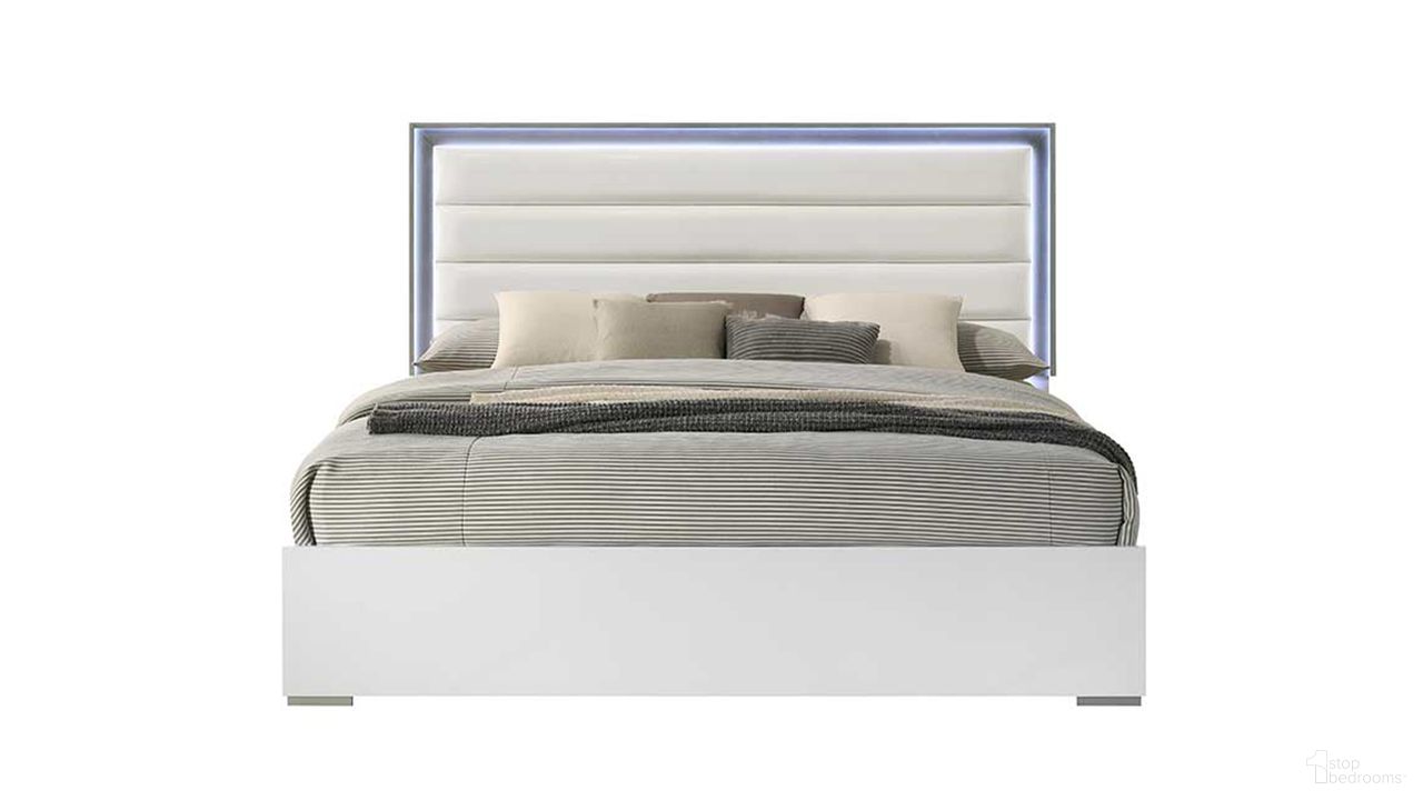 The appearance of Olivia Queen Panel Bed In White designed by Galaxy Home Furnishings in the modern / contemporary interior design. This white piece of furniture  was selected by 1StopBedrooms from Olivia Collection to add a touch of cosiness and style into your home. Sku: 601955554466-1;601955554466-2. Bed Type: Panel Bed. Bed Size: Queen. Material: Solid Wood.