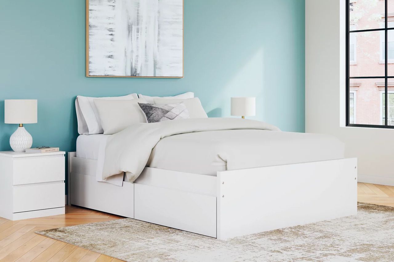 The appearance of Onita Platform Bedroom Set with 1 Side Storage In White designed by Signature Design by Ashley in the modern / contemporary interior design. This white piece of furniture was selected by 1StopBedrooms from Onita Collection to add a touch of cosiness and style into your home. Sku: B100-13;EB9630-261;EB9630-55;EB9630-95;EB9630-292. Material: Wood. Bed Size: King.