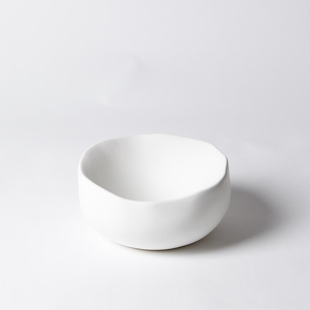The appearance of Organic Small Round Bowl In Matte White designed by Global Views in the modern / contemporary interior design. This matte white piece of furniture  was selected by 1StopBedrooms from Organic Collection to add a touch of cosiness and style into your home. Sku: 331438. Material: MDF.