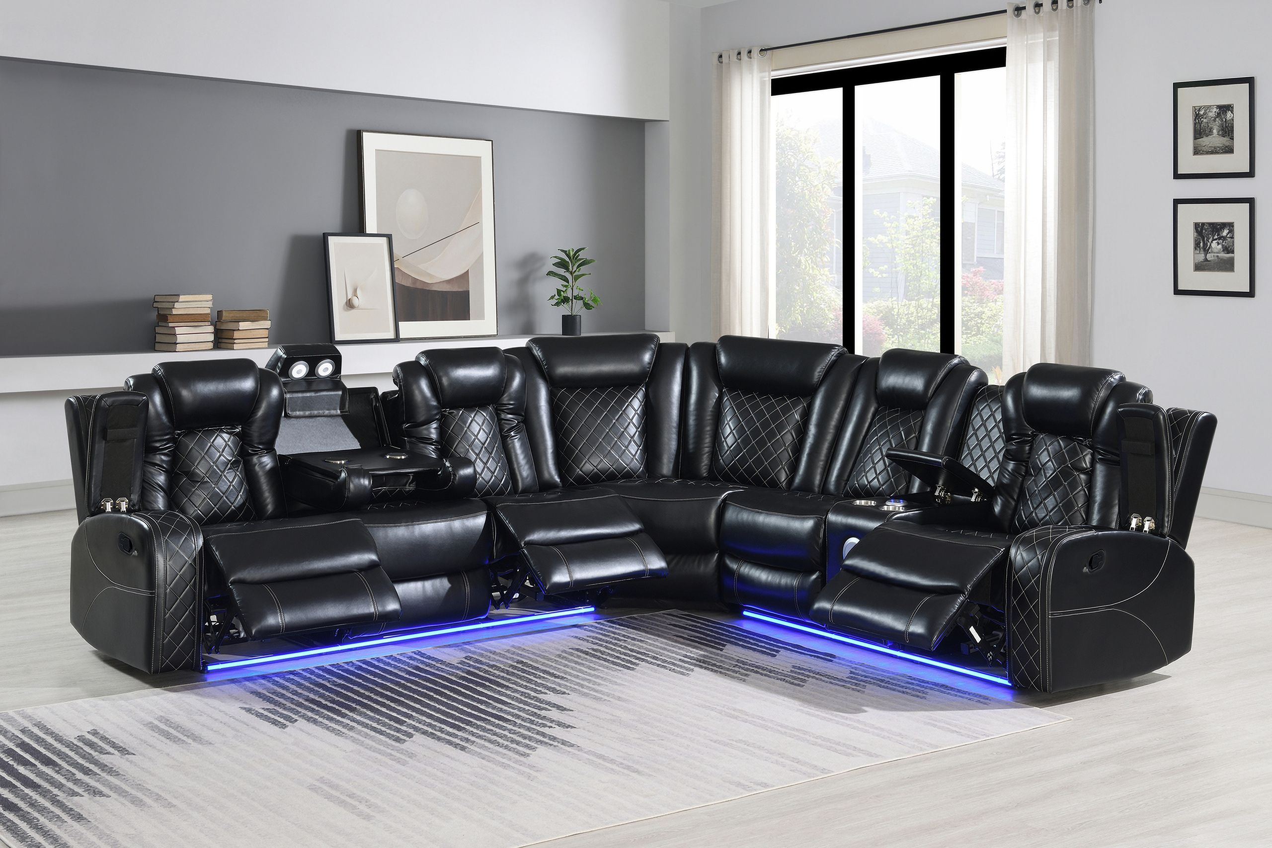 The appearance of Orion II 3 Piece Power Motion Sectional with 3 Recliners and Adjustable Headrests In Black designed by New Classic in the modern / contemporary interior design. This black piece of furniture was selected by 1StopBedrooms from Orion Collection to add a touch of cosiness and style into your home. Sku: U1769V-L30P2-BLK;U1769V-R25P2-BLK;U1769V-WG-BLK. Material: Leather.