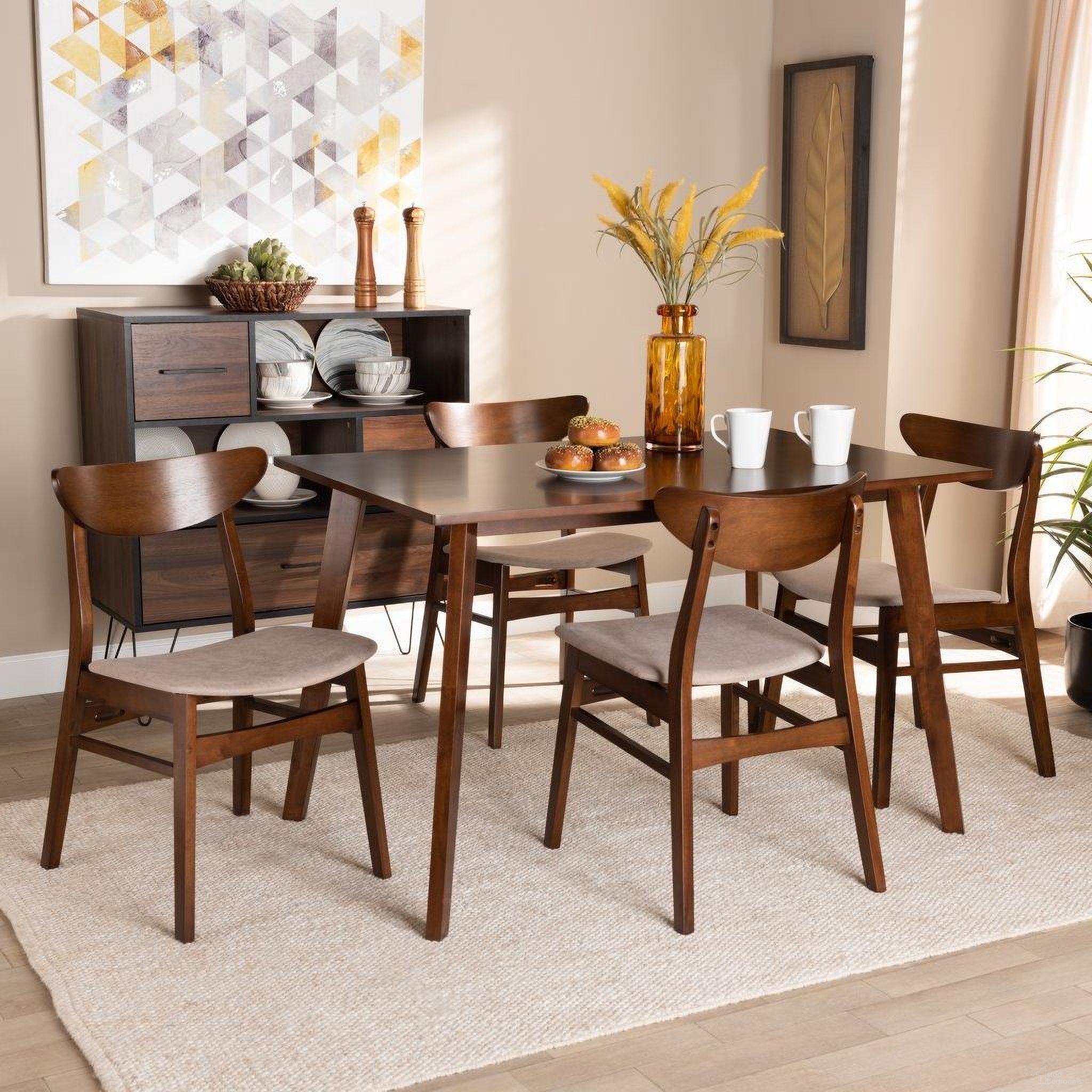 The appearance of Orion Mid-Century Modern Transitional Light Beige Fabric Upholstered and Walnut Brown Finished Wood 5-Piece Dining Set designed by Baxton Studio in the transitional interior design. This light beige piece of furniture was selected by 1StopBedrooms from Orion Collection to add a touch of cosiness and style into your home. Sku: Parlin/Fiesta-Latte/Walnut-5PC Dining Set. Material: Rubberwood.