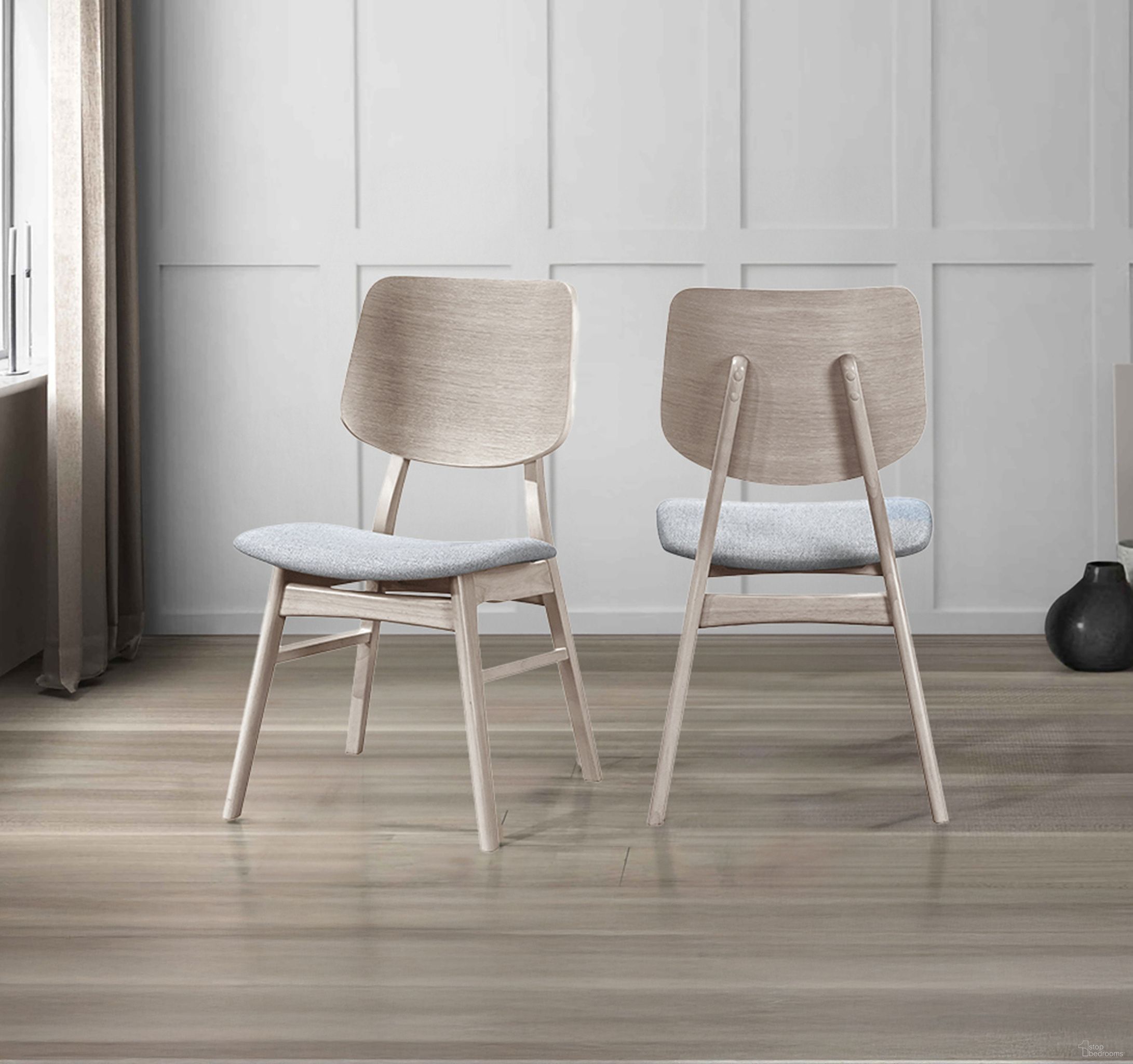 The appearance of Oscar Wood Back Chair Set of 2 In White Ash designed by New Classic in the modern / contemporary interior design. This white piece of furniture was selected by 1StopBedrooms from Oscar Collection to add a touch of cosiness and style into your home. Sku: D1651W-20. Material: Solid Wood. Chair Type: Side Chair.