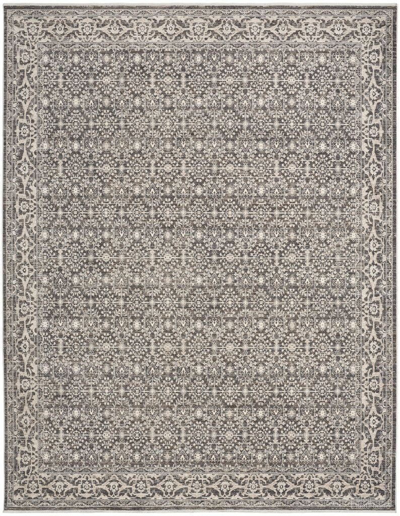 The appearance of Outlines Vintage 9' x 12' Indoor Rug In Charcoal and Ivory designed by Nourison in the rustic / southwestern interior design. This charcoal and ivory piece of furniture was selected by 1StopBedrooms from Outlines Collection to add a touch of cosiness and style into your home. Sku: 841491153697. Material: Polyester.