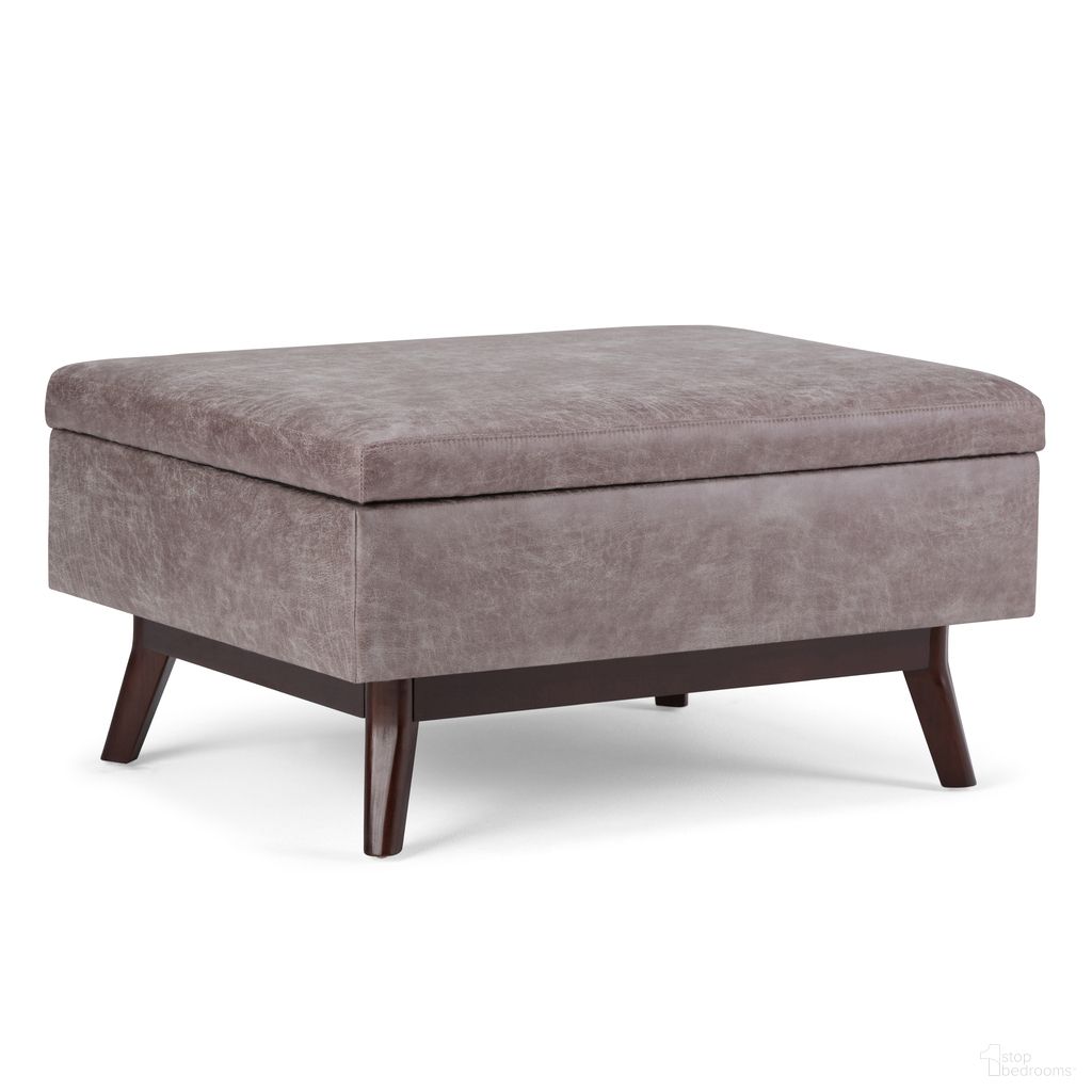 The appearance of Owen Vegan Faux Leather Coffee Table Storage Ottoman In Distressed Grey Taupe designed by Simpli Home in the transitional interior design. This distressed grey taupe piece of furniture was selected by 1StopBedrooms from Owen Collection to add a touch of cosiness and style into your home. Sku: AXCOT267S-DTP. Material: Faux Leather.