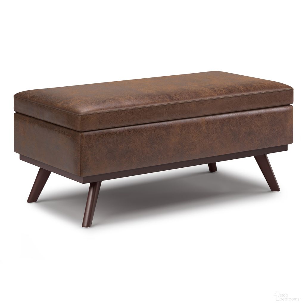 The appearance of Owen Vegan Faux Leather Lift Top Large Coffee Table Storage Ottoman In Distressed Chestnut Brown designed by Simpli Home in the transitional interior design. This distressed chestnut brown piece of furniture was selected by 1StopBedrooms from Owen Collection to add a touch of cosiness and style into your home. Sku: AXCOT267LT-DBR. Material: Faux Leather.