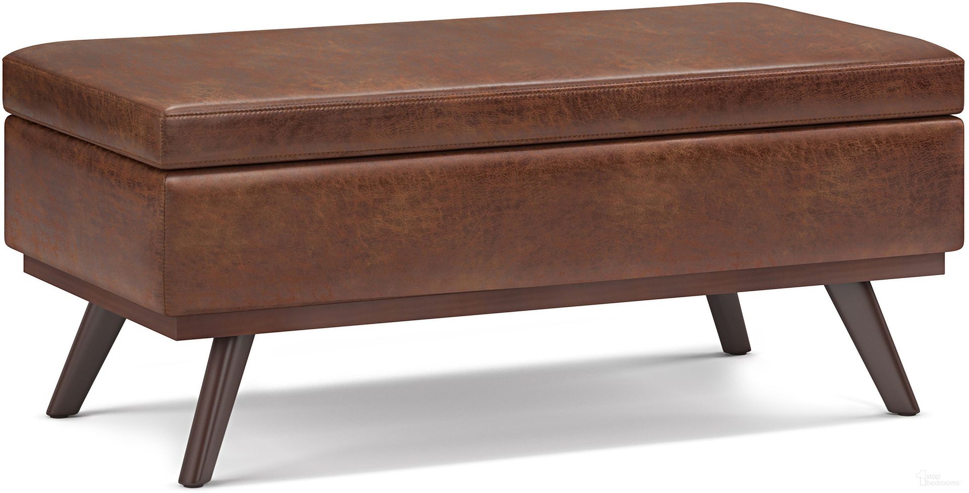 The appearance of Owen Vegan Faux Leather Lift Top Large Coffee Table Storage Ottoman In Distressed Saddle Brown designed by Simpli Home in the transitional interior design. This distressed saddle brown piece of furniture was selected by 1StopBedrooms from Owen Collection to add a touch of cosiness and style into your home. Sku: AXCOT267LT-DSB. Material: Faux Leather.