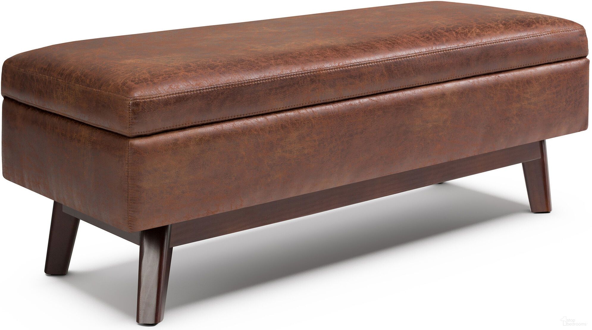 The appearance of Owen Vegan Faux Leather Rectangular Storage Ottoman In Distressed Saddle Brown designed by Simpli Home in the transitional interior design. This distressed saddle brown piece of furniture  was selected by 1StopBedrooms from Owen Collection to add a touch of cosiness and style into your home. Sku: AXCOT267R-DSB. Material: Faux Leather.