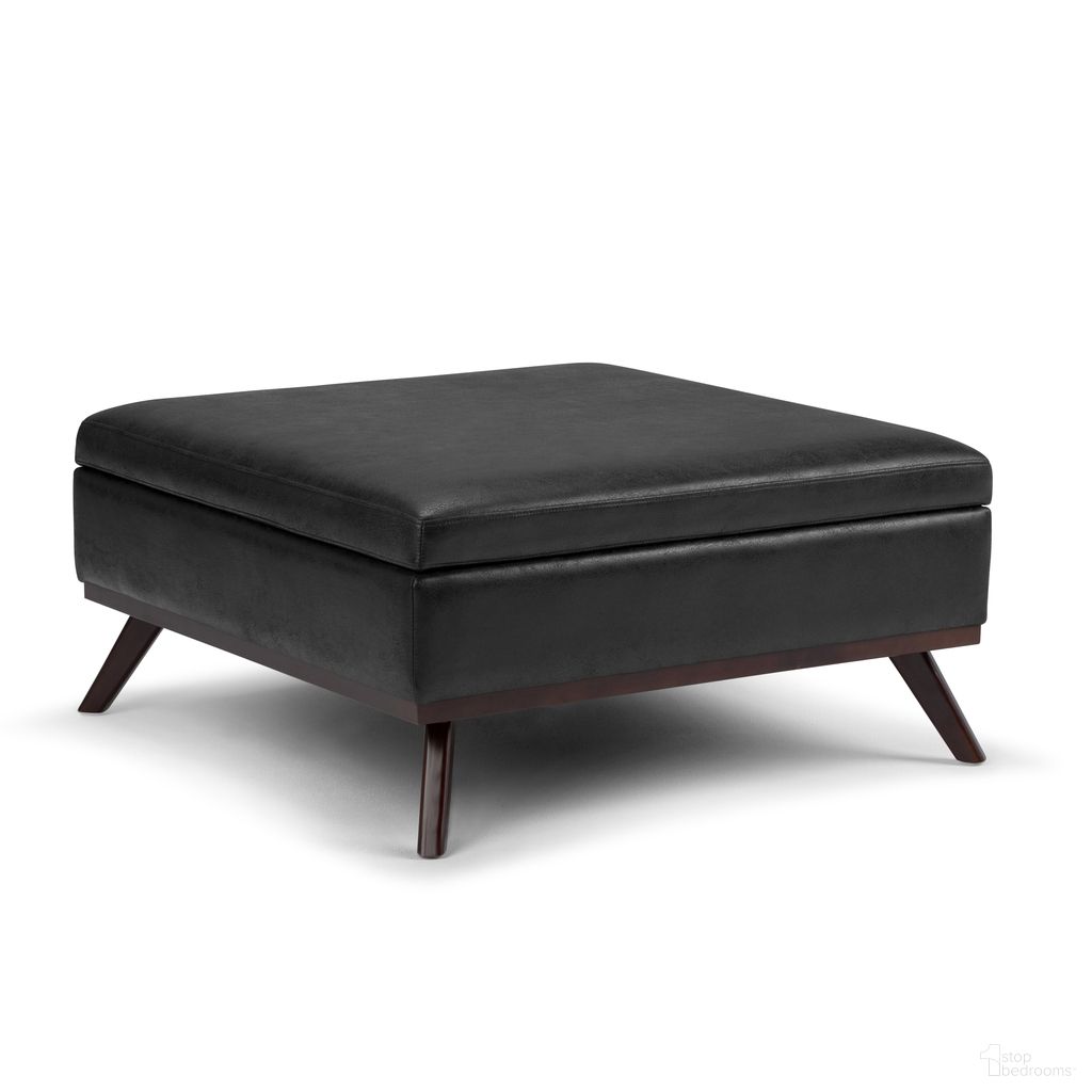 The appearance of Owen Vegan Faux Leather Square Coffee Table Storage Ottoman In Distressed Black designed by Simpli Home in the transitional interior design. This distressed black piece of furniture was selected by 1StopBedrooms from Owen Collection to add a touch of cosiness and style into your home. Sku: AXCOT267M-DBL. Material: Faux Leather.
