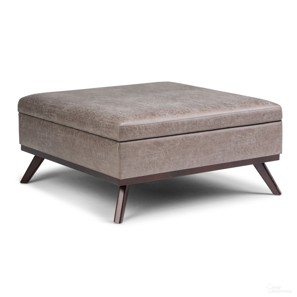 The appearance of Owen Vegan Faux Leather Square Coffee Table Storage Ottoman In Distressed Grey Taupe designed by Simpli Home in the transitional interior design. This distressed grey taupe piece of furniture was selected by 1StopBedrooms from Owen Collection to add a touch of cosiness and style into your home. Sku: AXCOT267M-DTP. Material: Faux Leather.