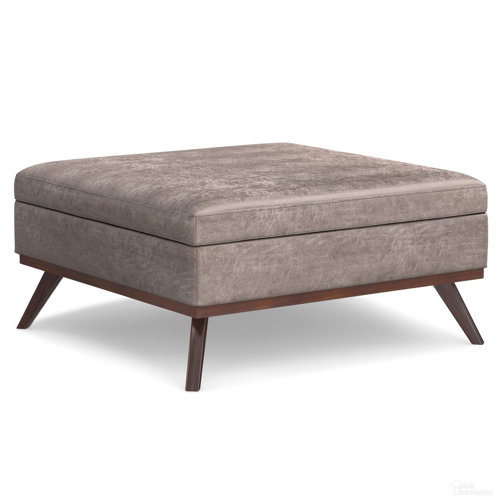 The appearance of Owen Vegan Faux Leather XL Square Coffee Table Storage Ottoman In Distressed Grey Taupe designed by Simpli Home in the transitional interior design. This distressed grey taupe piece of furniture  was selected by 1StopBedrooms from Owen Collection to add a touch of cosiness and style into your home. Sku: AXCOT267XL-DTP. Material: Faux Leather.