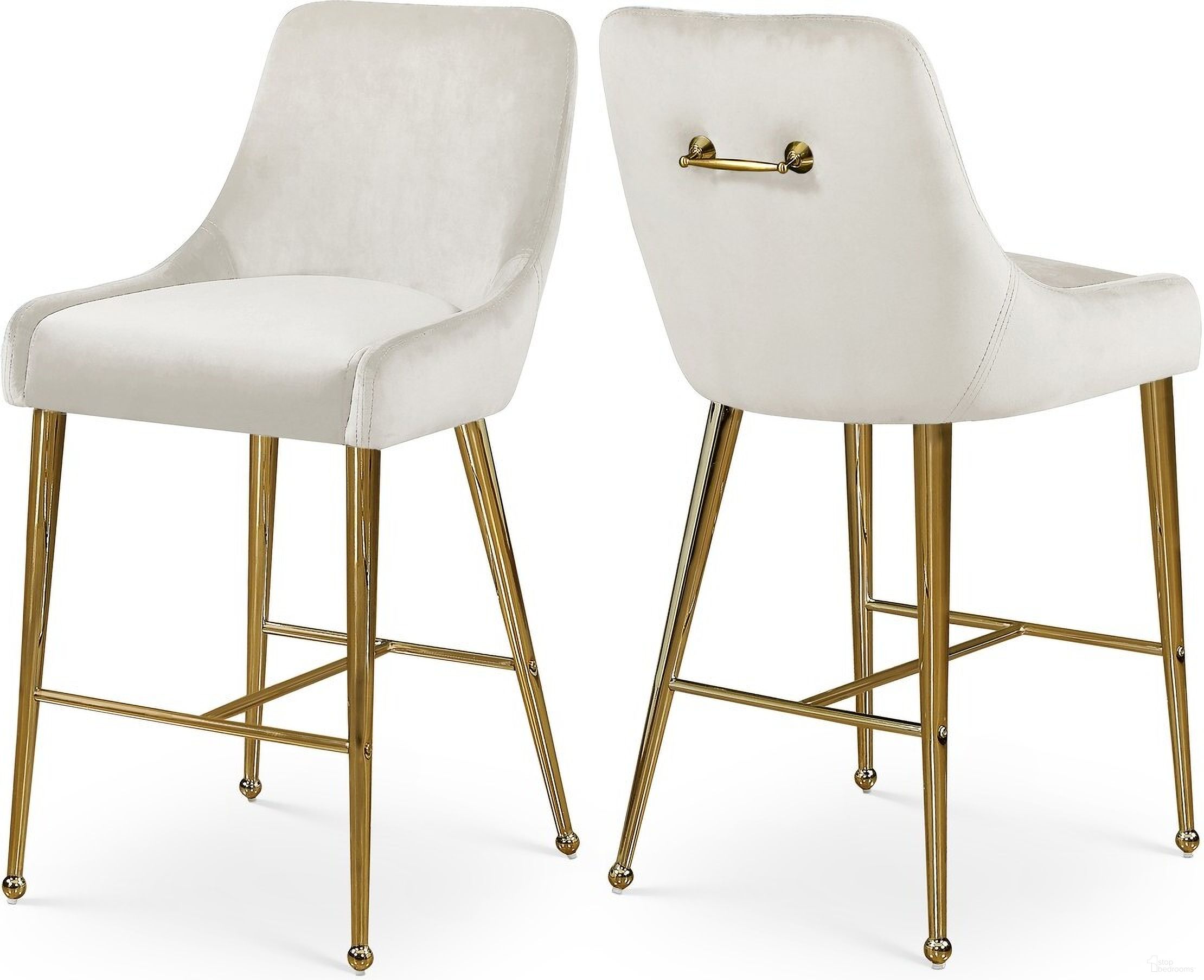 The appearance of Owen Velvet Stool Set of 2 In Cream designed by Meridian in the modern / contemporary interior design. This cream velvet piece of furniture  was selected by 1StopBedrooms from Owen Collection to add a touch of cosiness and style into your home. Sku: 745Cream. Material: Velvet.